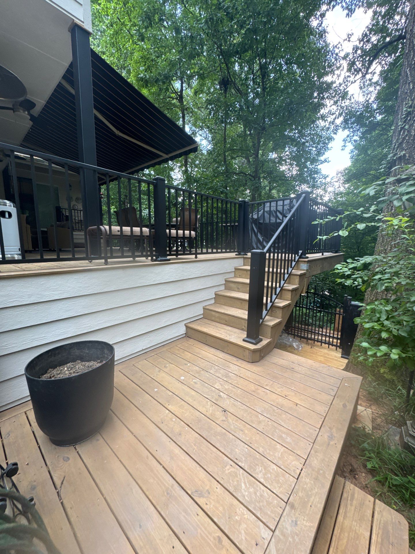 Multi-Level Wood Deck Staining and Restoration in Atlanta by Swift Home Renovations