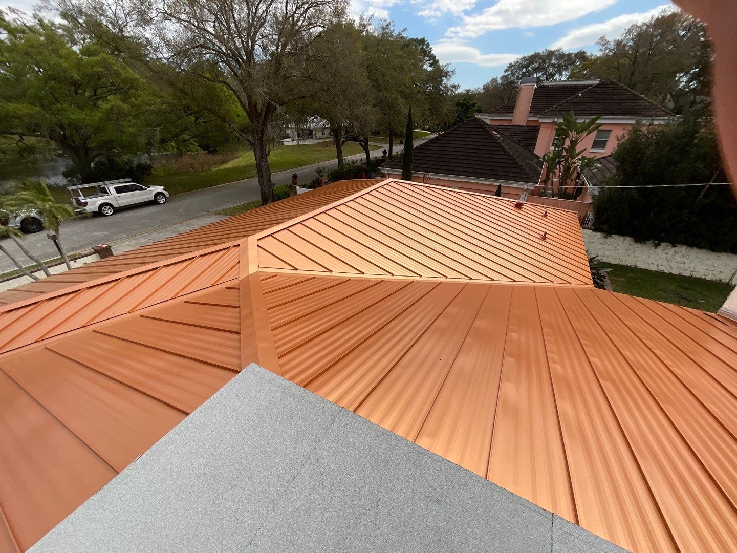 Residential Re-Roof using MS Metals, Copper Penny, Standing Seam. by First Due Roofing