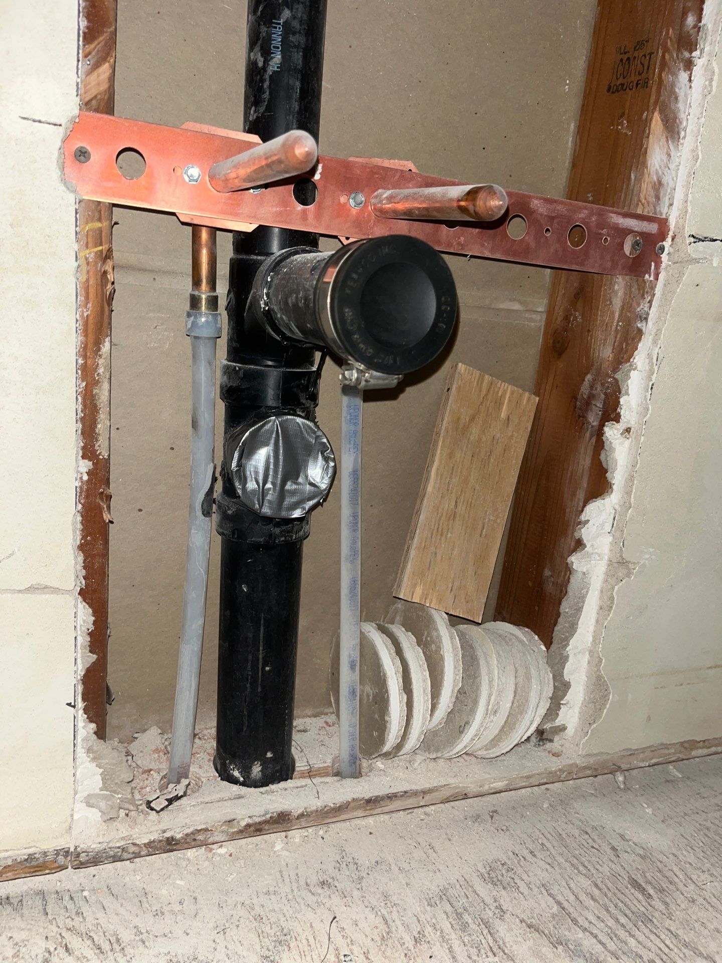 Installation of New Tall Black Piping (Wall to Ceiling) & Underground Piping by Us Plumbing