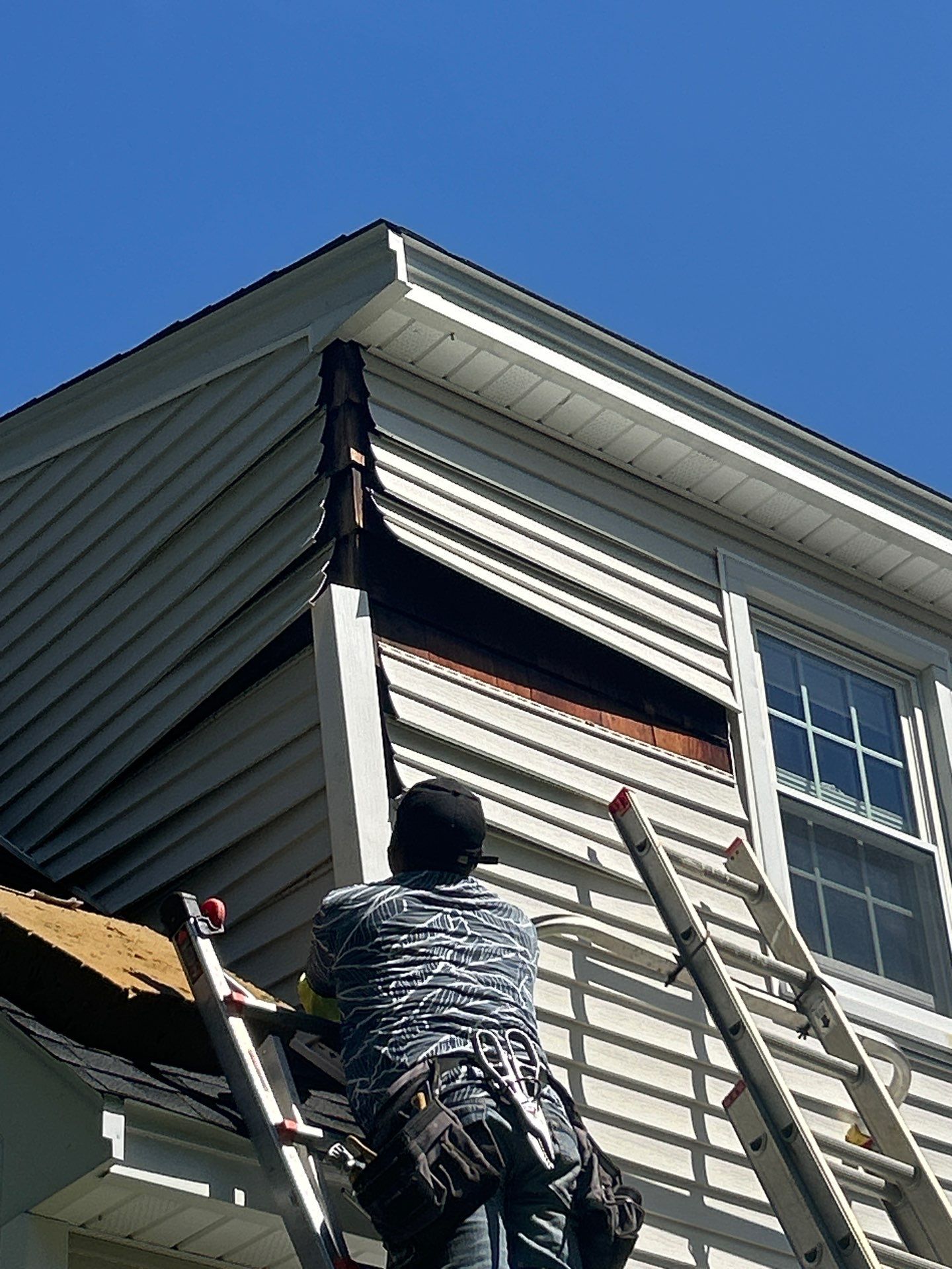 Vinyl Siding Repair with Spot Replacement by Mighty Dog Roofing of Greater Middlesex County