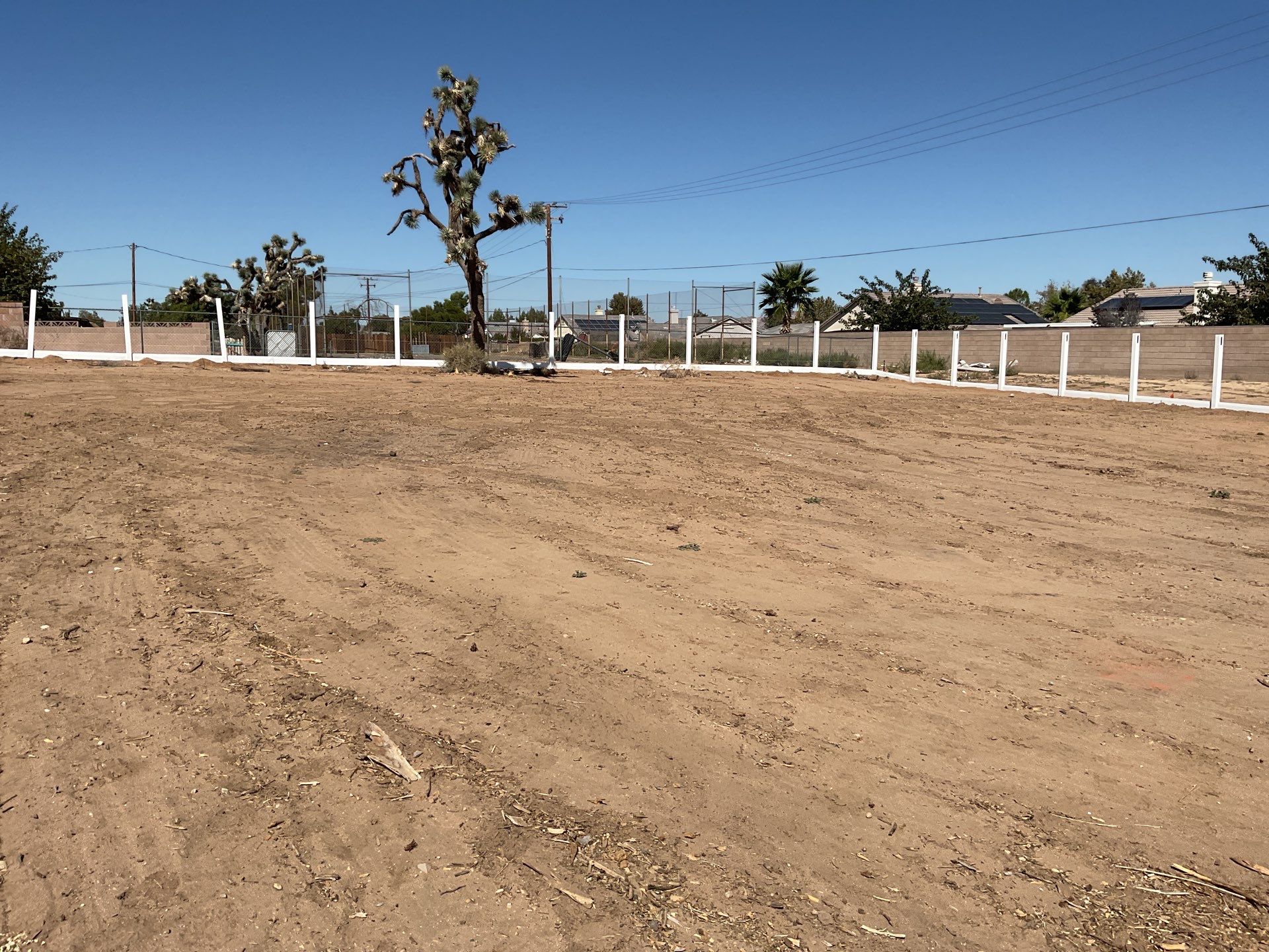 White picket fence  by Fence Guys Inc. 