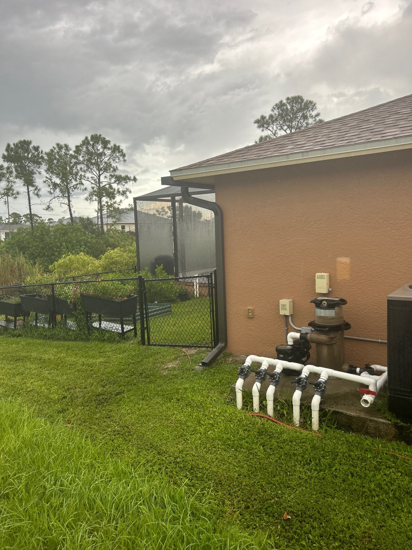 Linen seamless gutters and downspouts installation in Sarasota, FL by Gutter Professors
