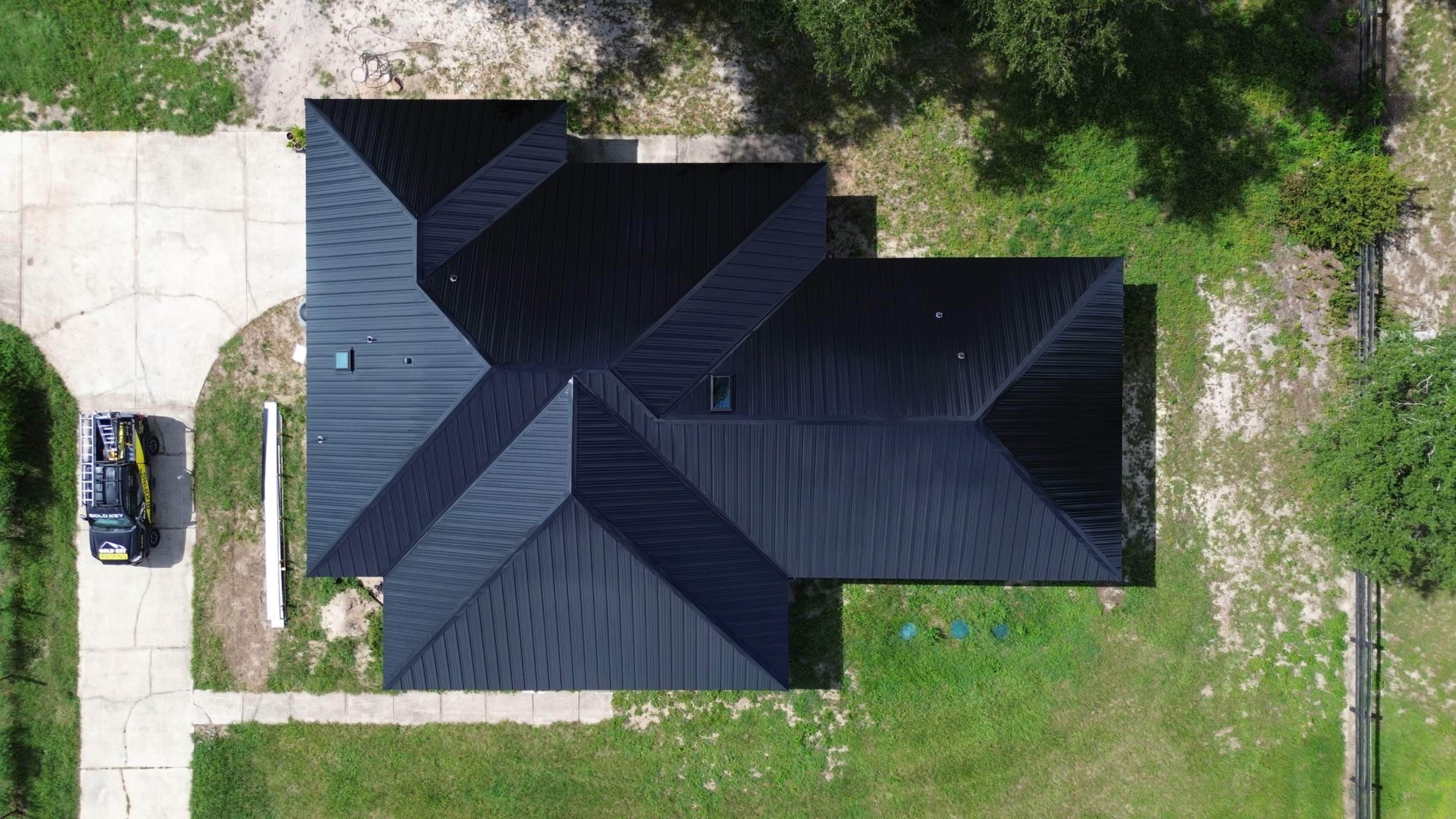Residential Reroof | Architectural Shingles to 26 Gauge Standing Seam Metal | Groveland Fl by Gold Key Roofing