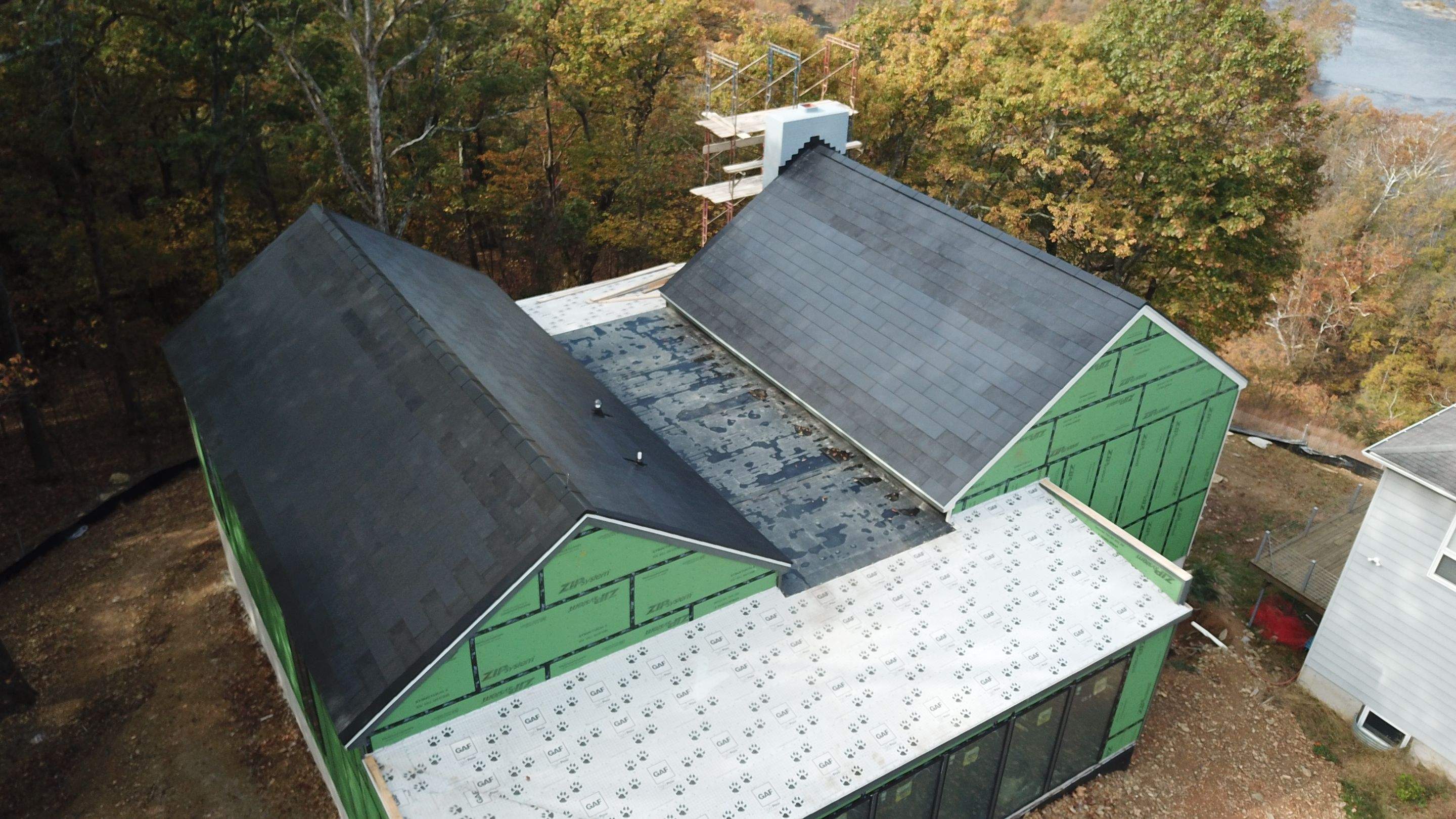 Roof Installation using Tesla Solar Roof V3 by American Home Contractors