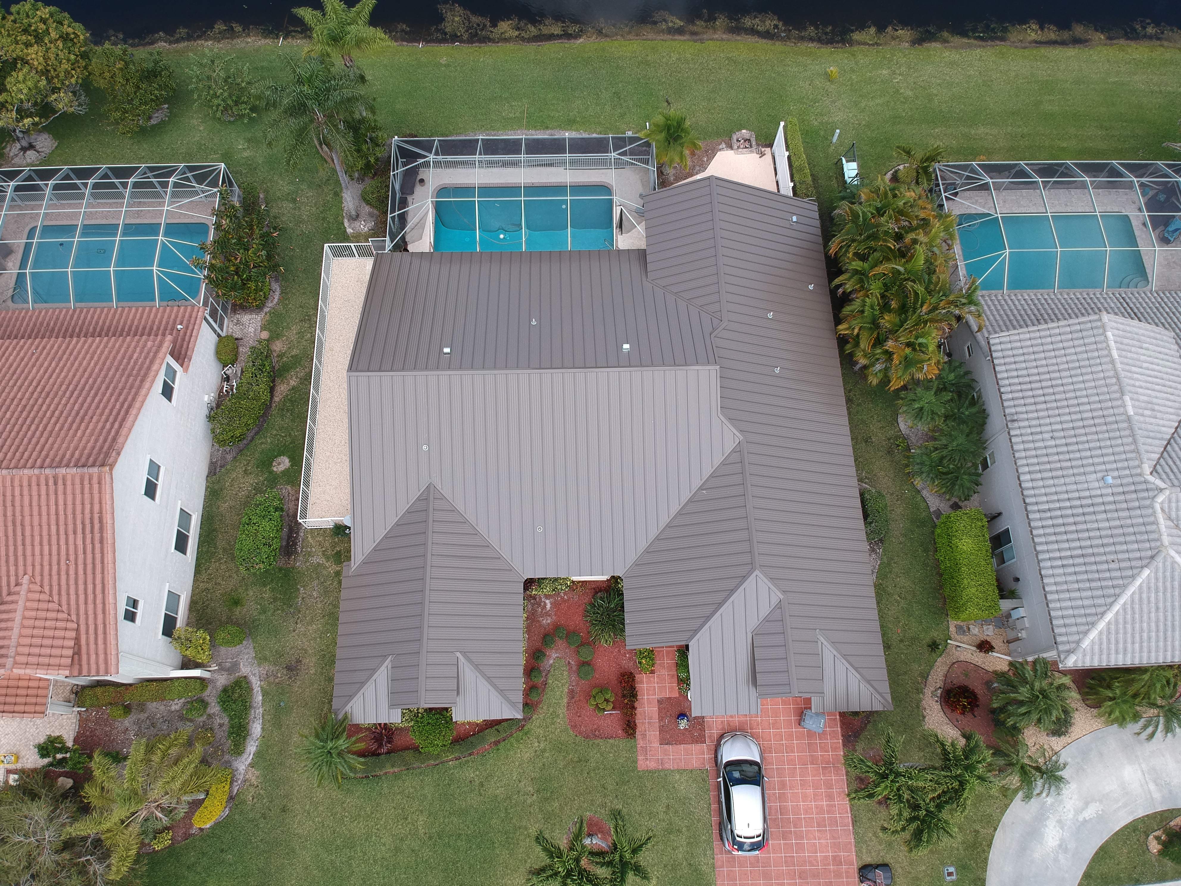 Residential Roofing Installation using 1" Nail strip metal roof by BLUES BROTHERS ROOFING
