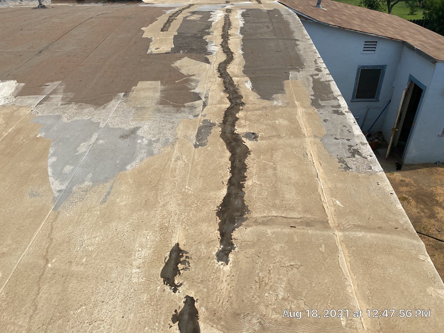 Residential Roofing Installation using Spray foam roofing insulation and General Coatings acrylic coatings by Straight Edge Roofing Inc