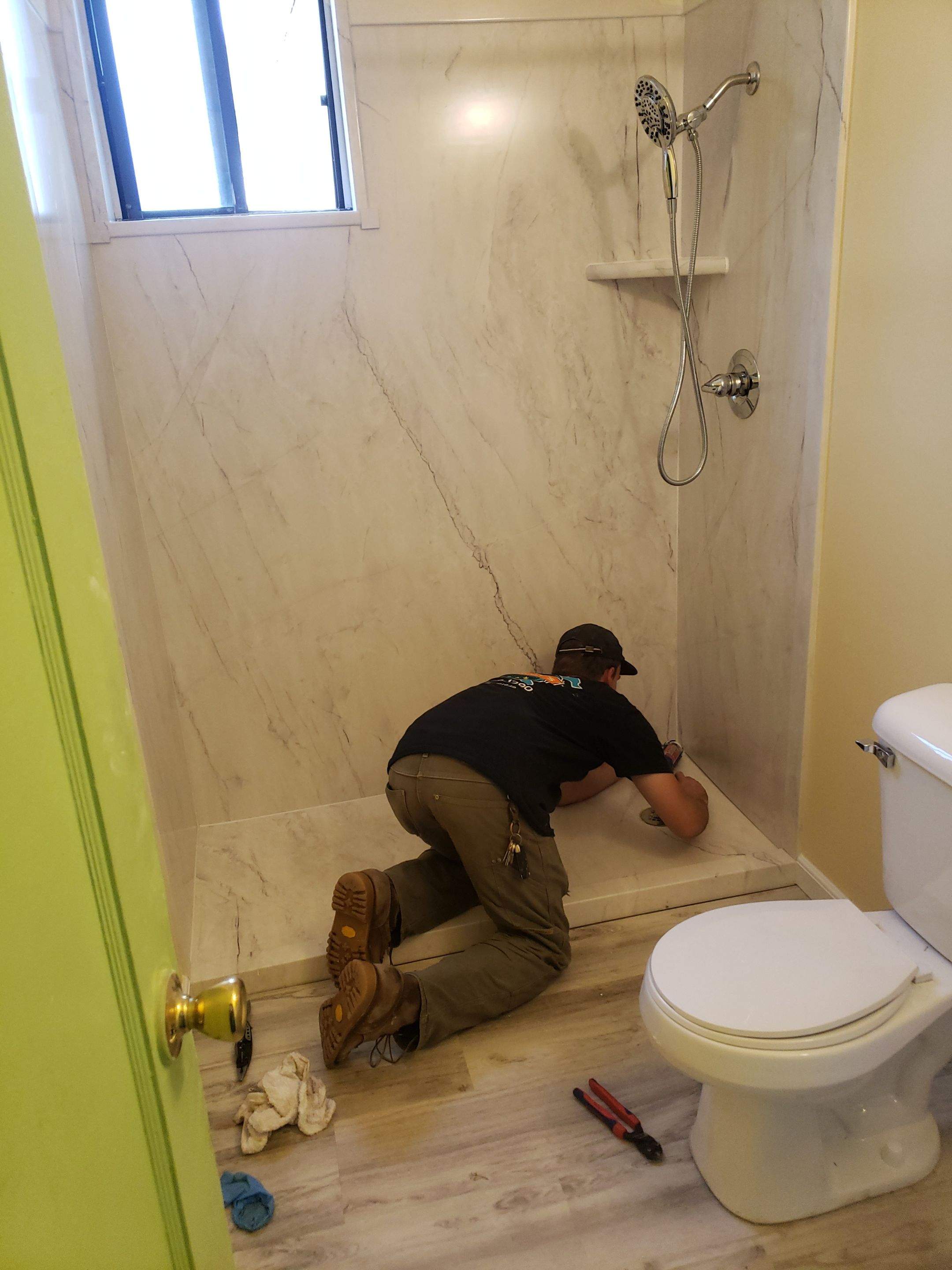 Studs to Stunning: Bathroom Remodel with FlexStone by McCray's Handyman, Inc.