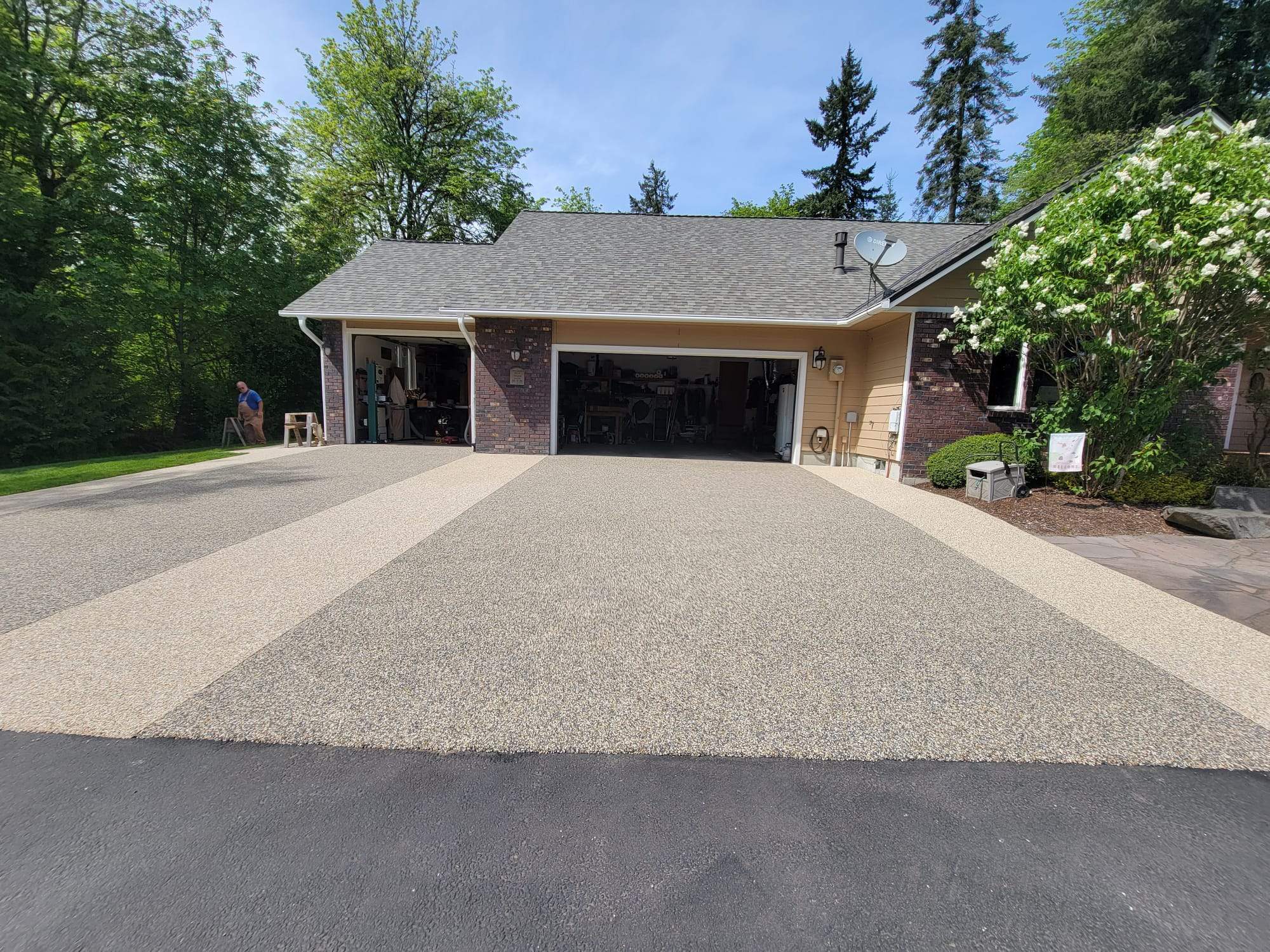 Luxury Driveway with Big Sur and Sistine Chapel Borders by Concrete Coating Experts Inc.
