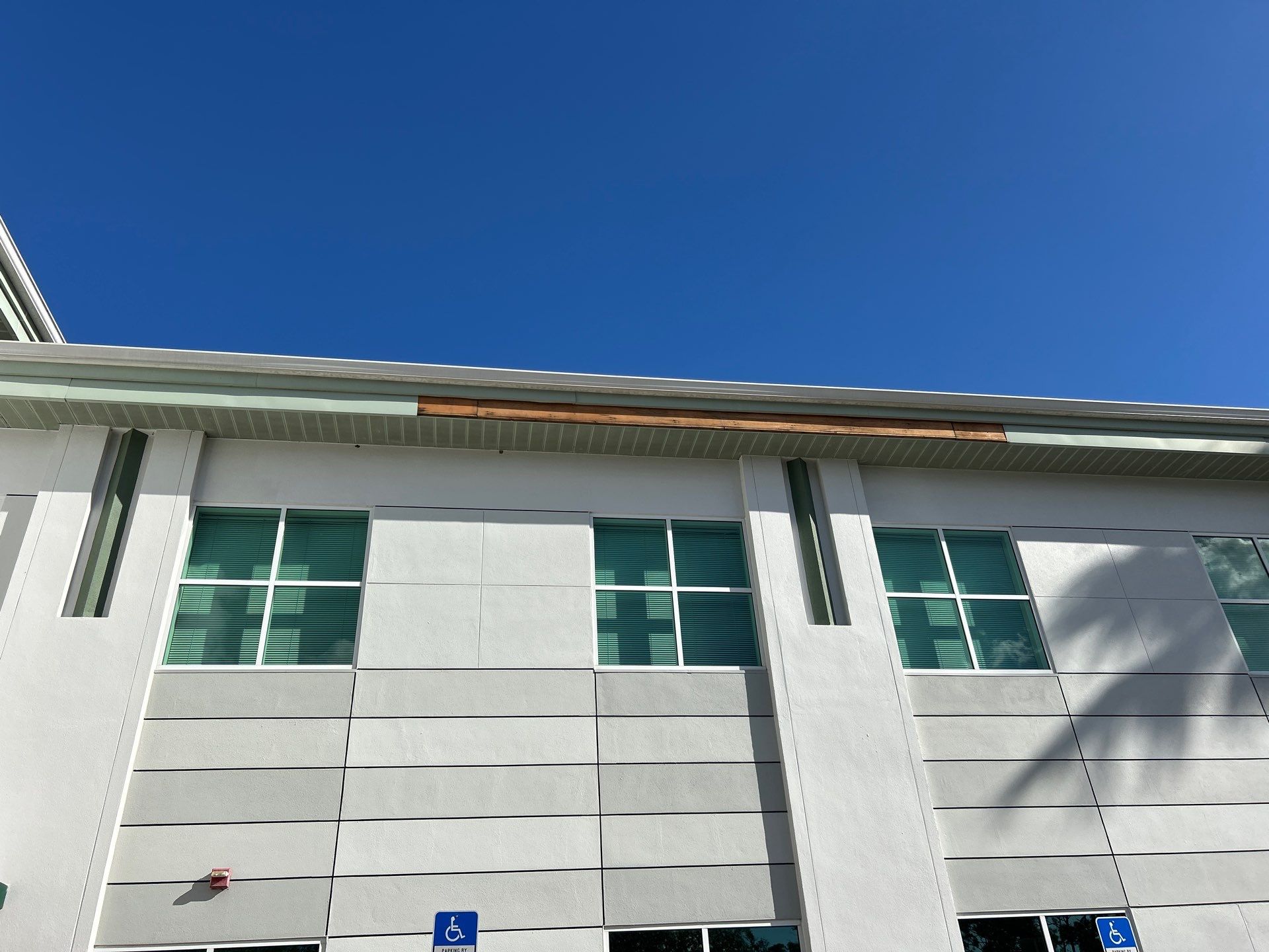 White Soffit and Fascia Repair Project in Sarasota FL by Gutter Professors