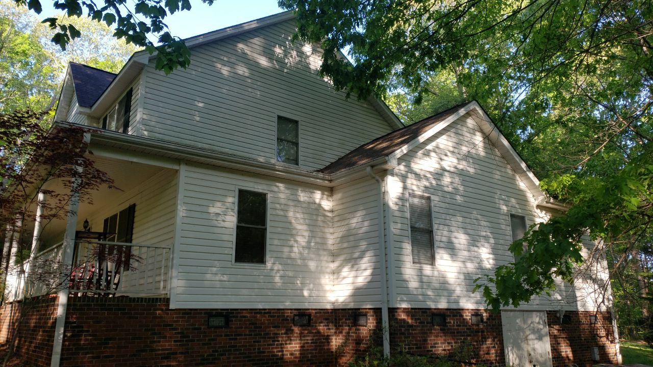 House Wash using cleaner by Power Wash Masters LLC