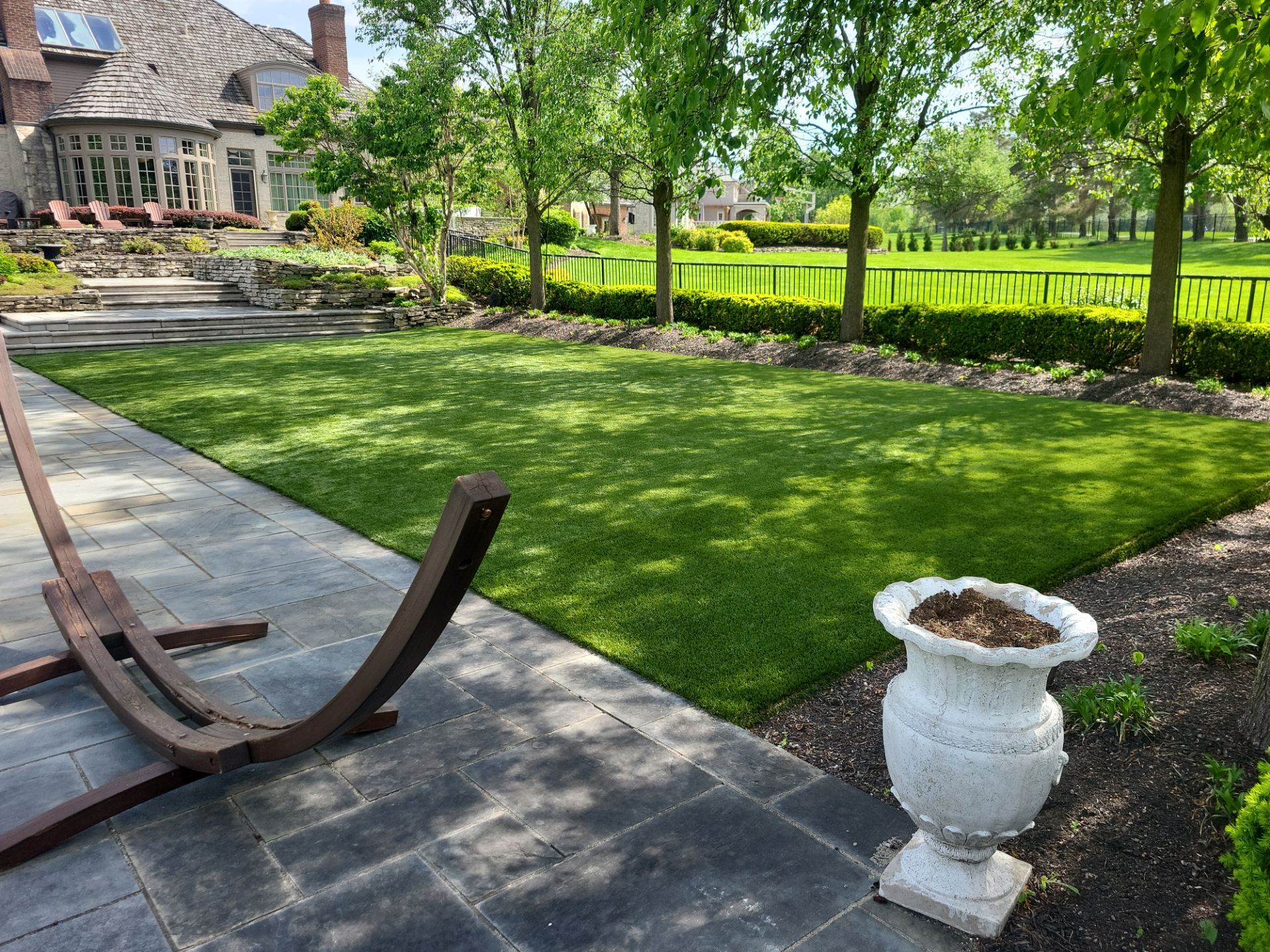 Muirfield Village backyard by Southwest Greens Midwest