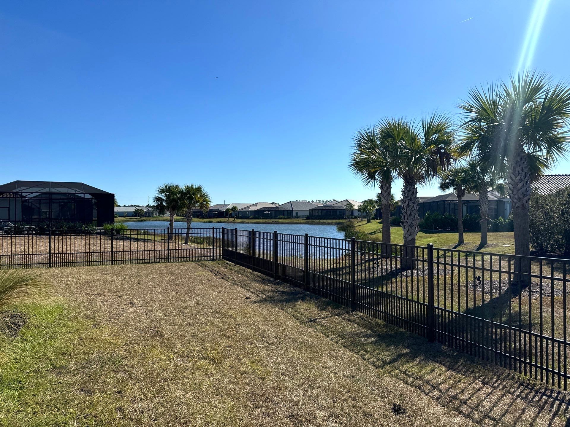 Aluminum Fence Installation using 4Ft 3 Rail Bronze Puppy Picket Aluminum Fence by Asap fence and gates, LLC