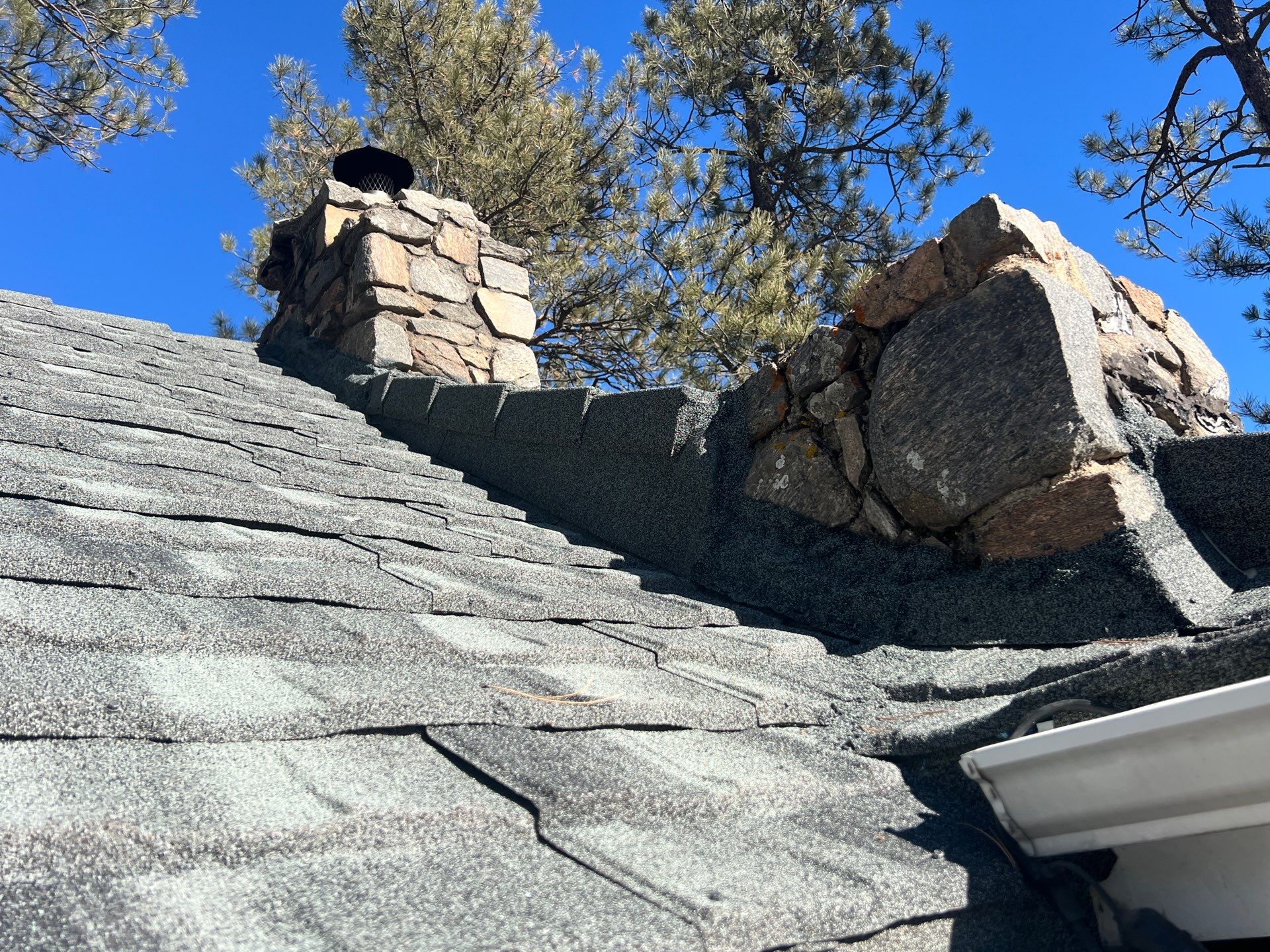 Residential Roofing Installation using Stone Coated Steel by Blue Peaks Roofing LLC 
