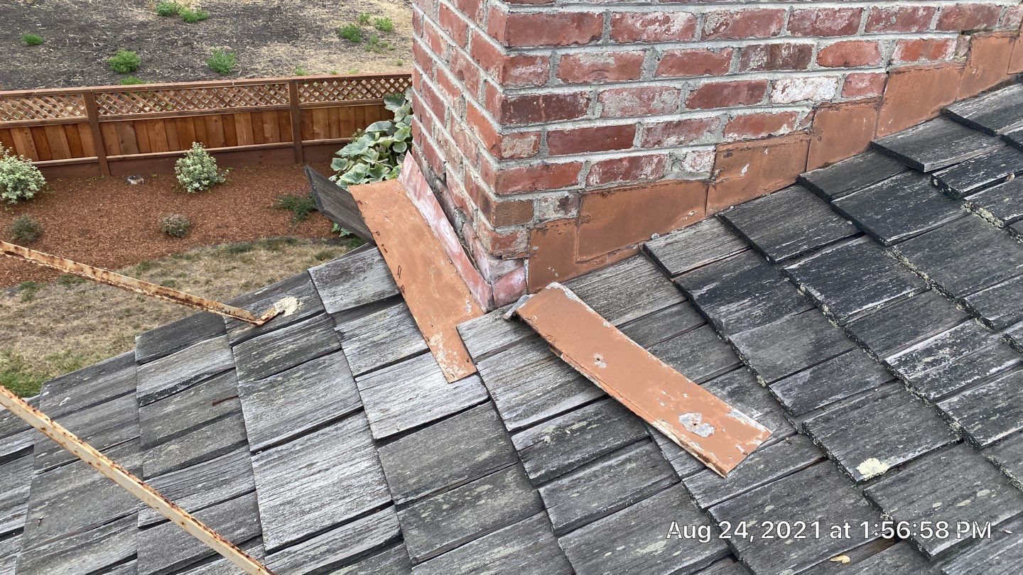 Refurbish and repair shake roof to get ready to sell by Straight Edge Roofing Inc