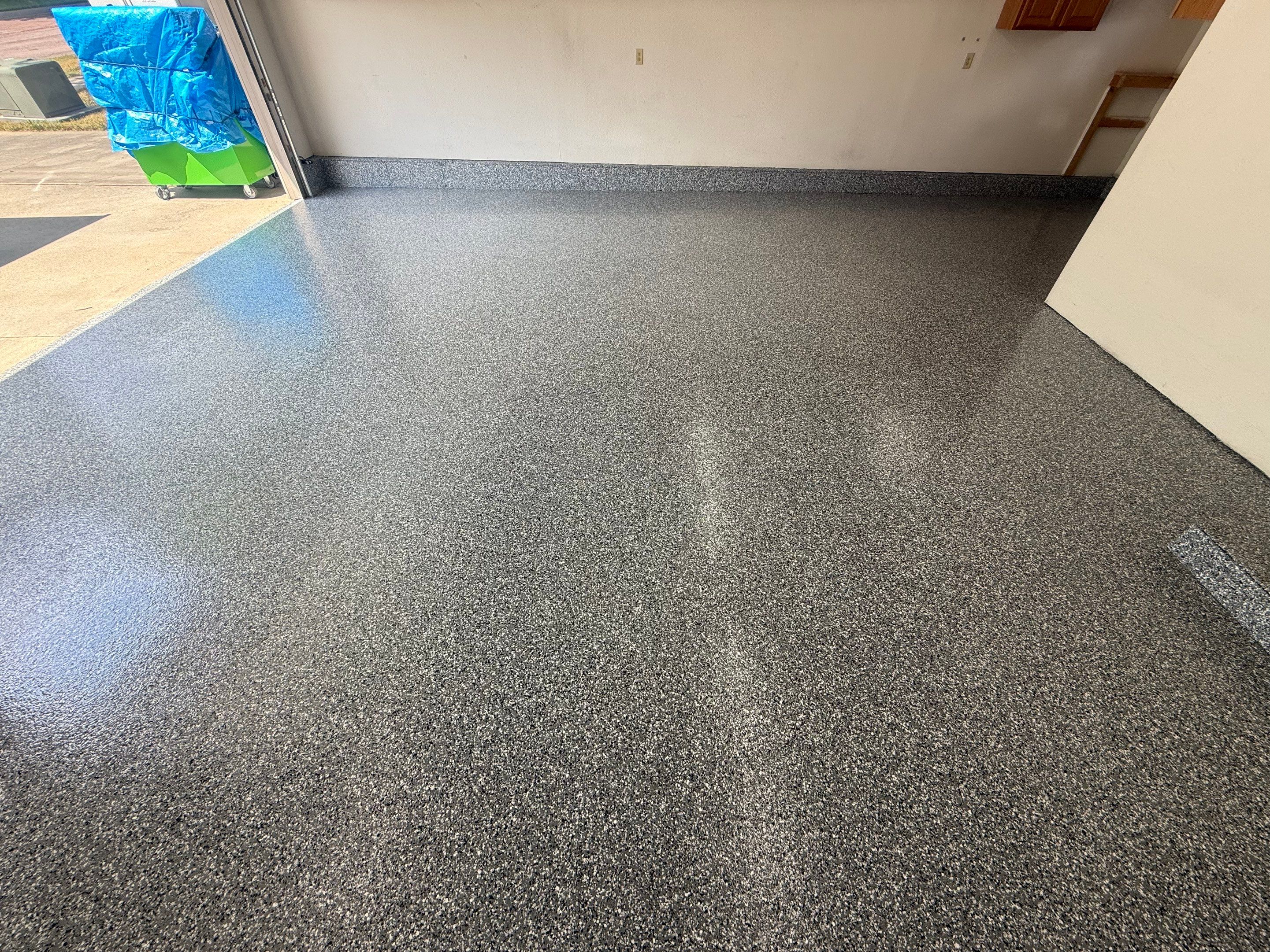 Smoke Flake Garage Floor Coating in Dell Rapids by Select Painting, Coatings & Garage Cabinets