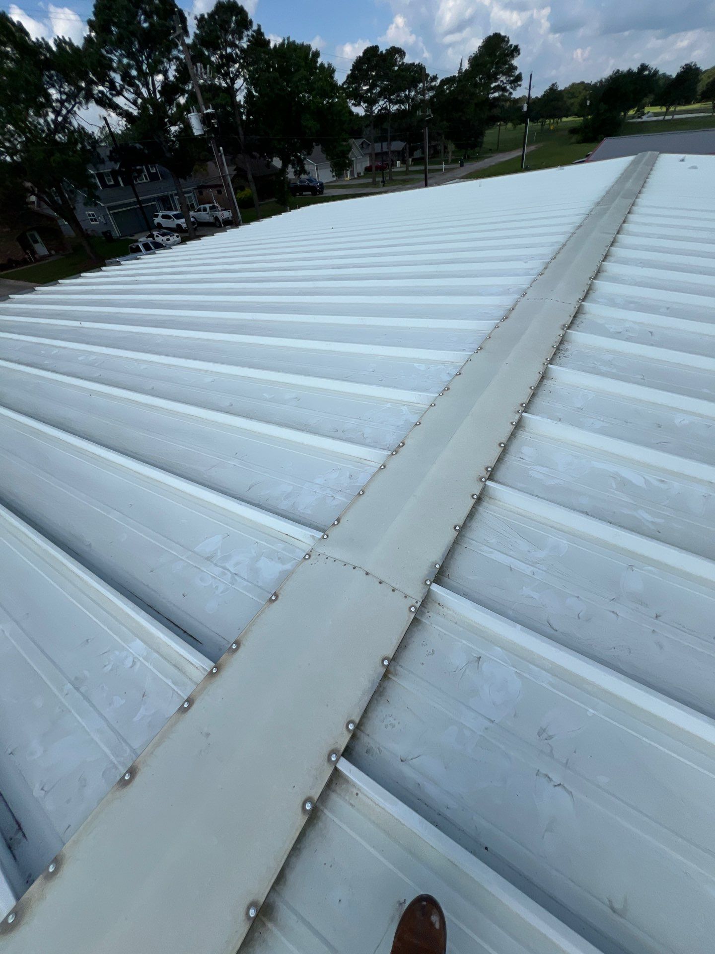 Commercial Roofing Repair using Metal by Roof Repair Company