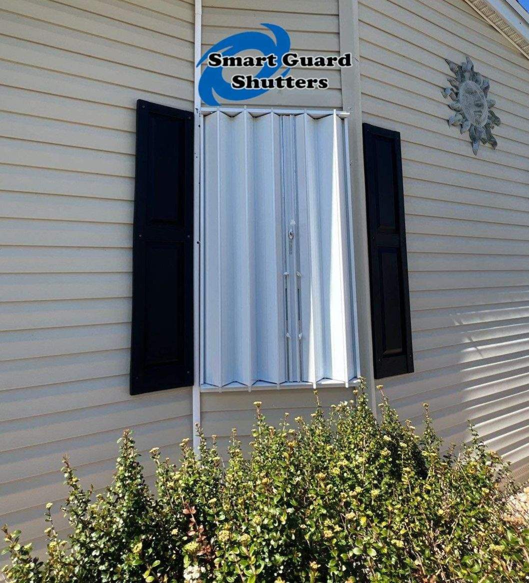Accordion Shutters & Hurricane Fabric by Smart Guard Shutters