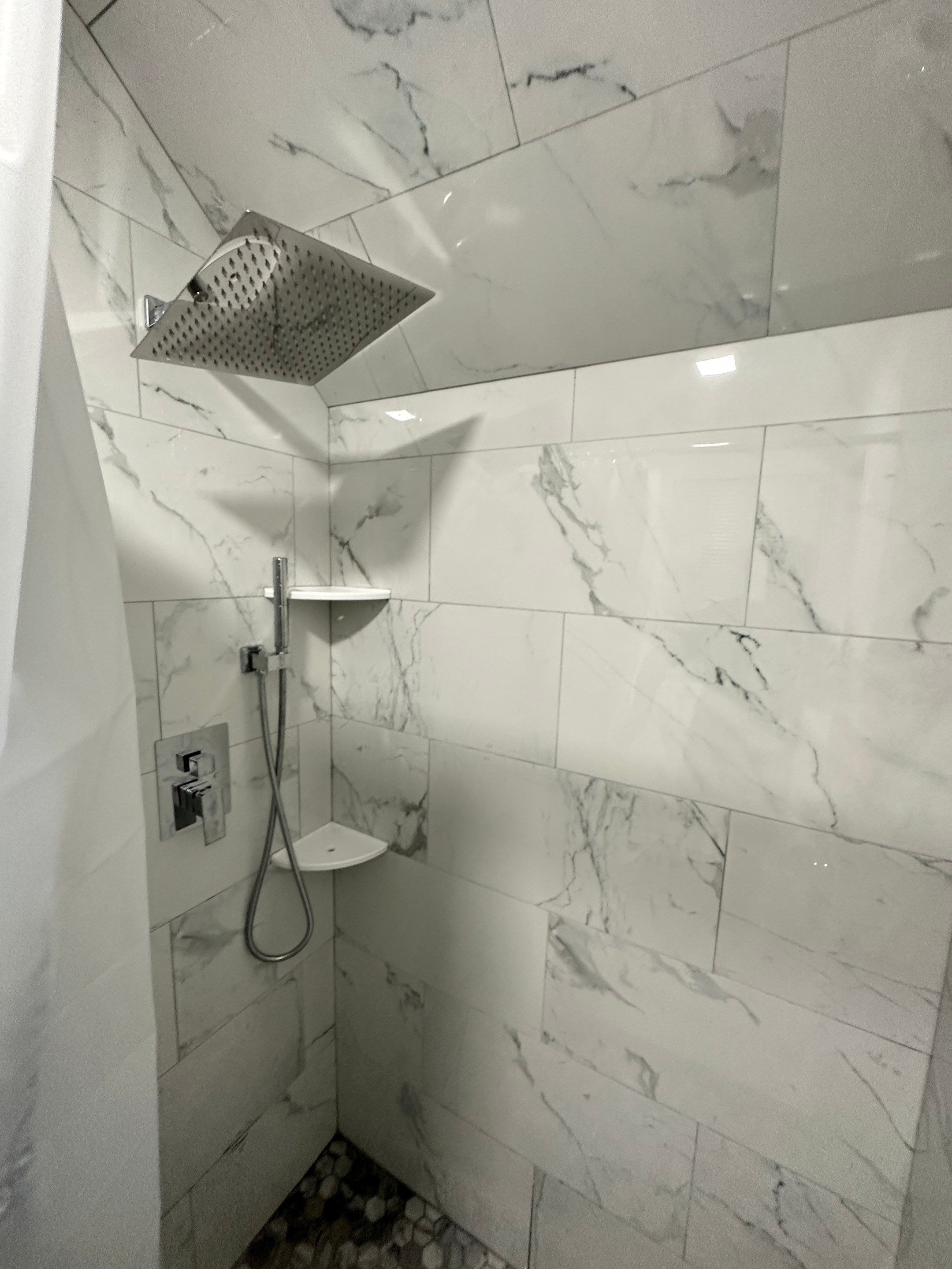 Bathroom Remodel using Tile by Home Concepts Construction