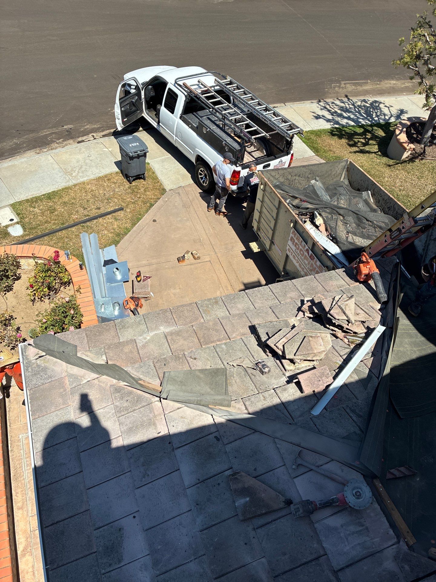 Carlsbad Concrete Tile Roof Replacement with Copper Flashing and Skylights by Reliable Roofing San Diego Inc.