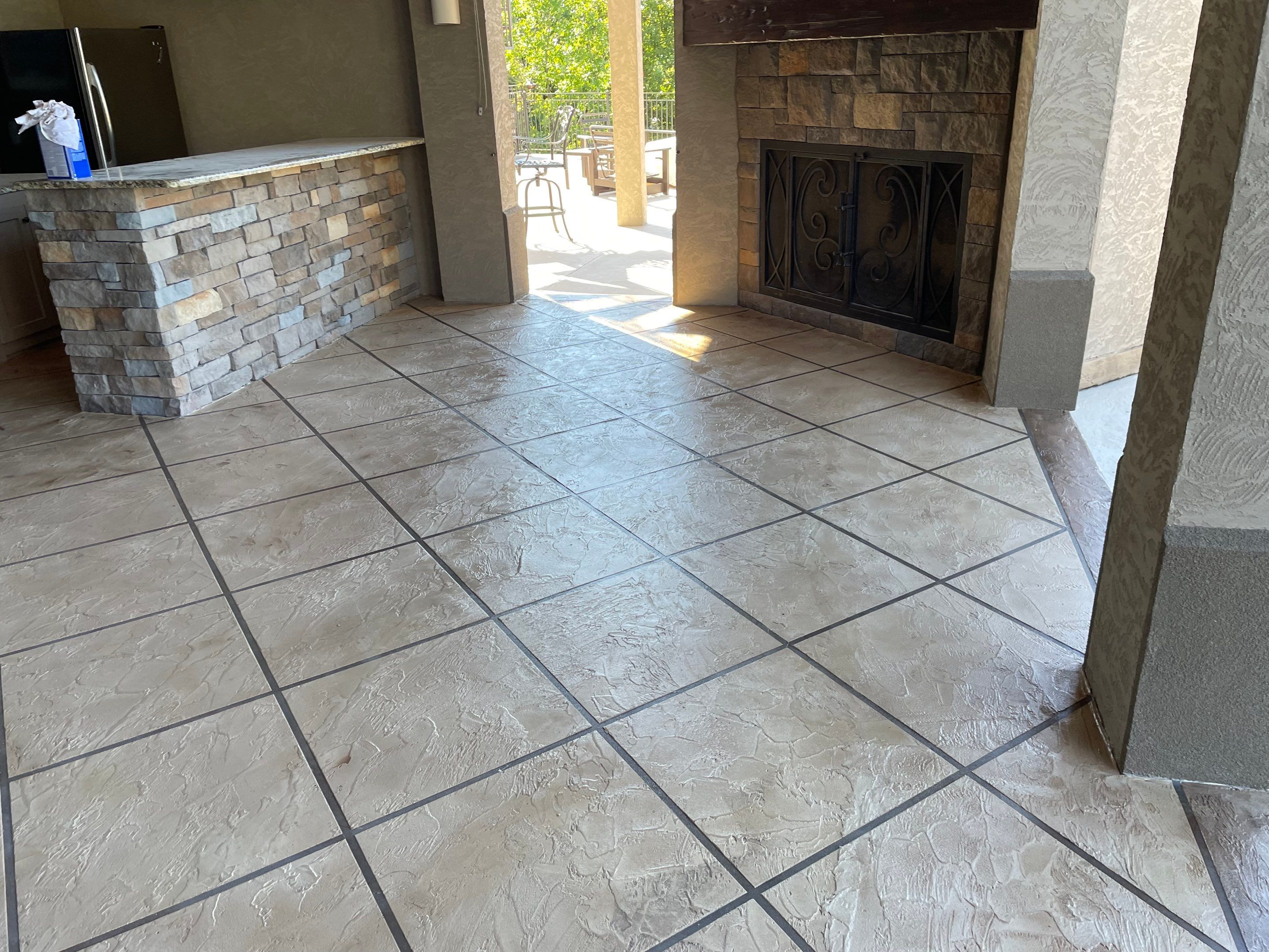 Lake Lotawana -- Front Walkway and Back Patio Tuscan Overlay by Big Red Decorative Concrete, LLC