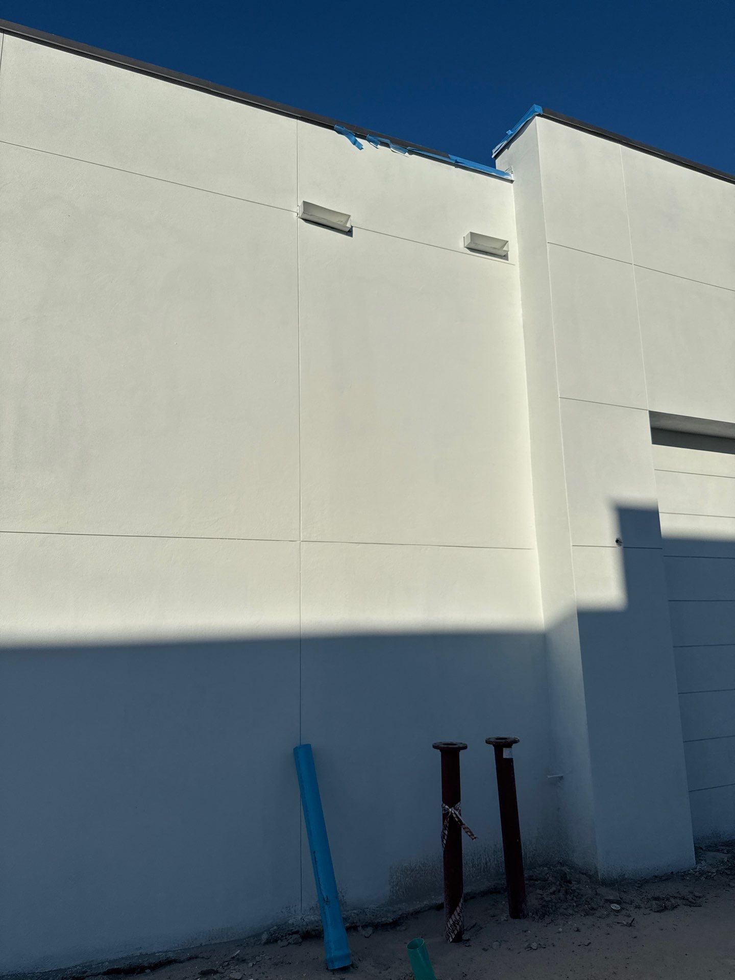 Downspout Installation using collector head in Cape Coral FL by Gutter Professors