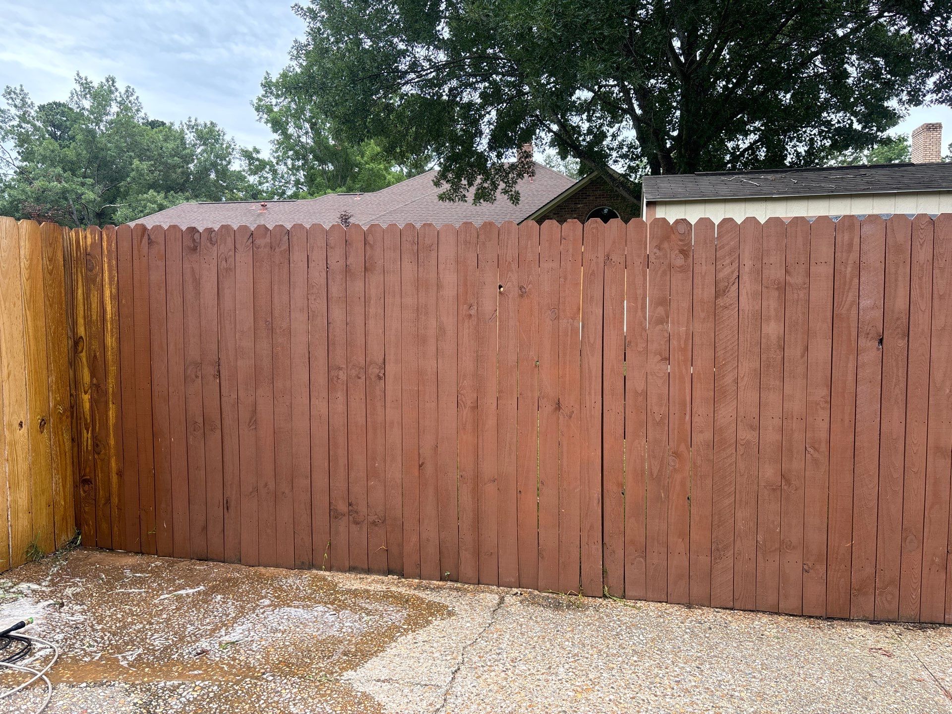 Project in TylerExterior Painting in Tyler, TX | White Brick Home, Varnished Fence & Shed Painting by Quality Coats Painting