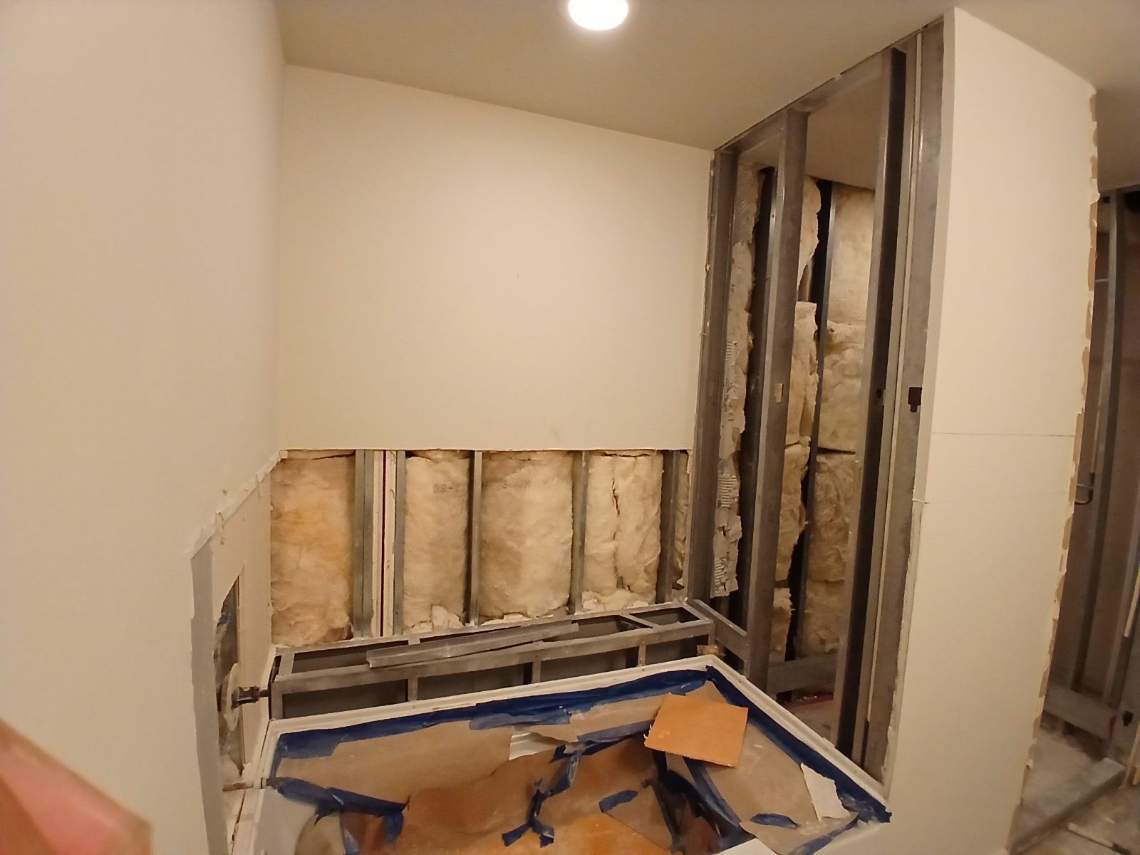 Modern Bathroom Transformation by Fine Line Flooring Inc.