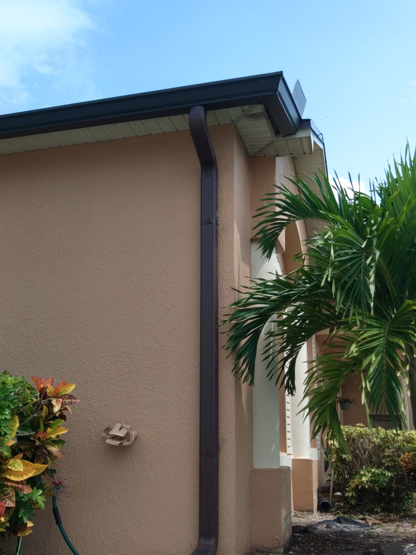 Downspout Installation for Multi-Story Homes in Cape Coral FL by Gutter Professors