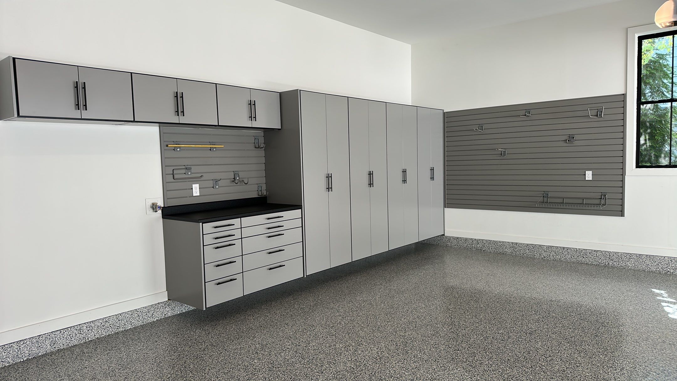 Jeanne E. transformed her garage with cabinets and a Banner Garage Floor by Banner Garage