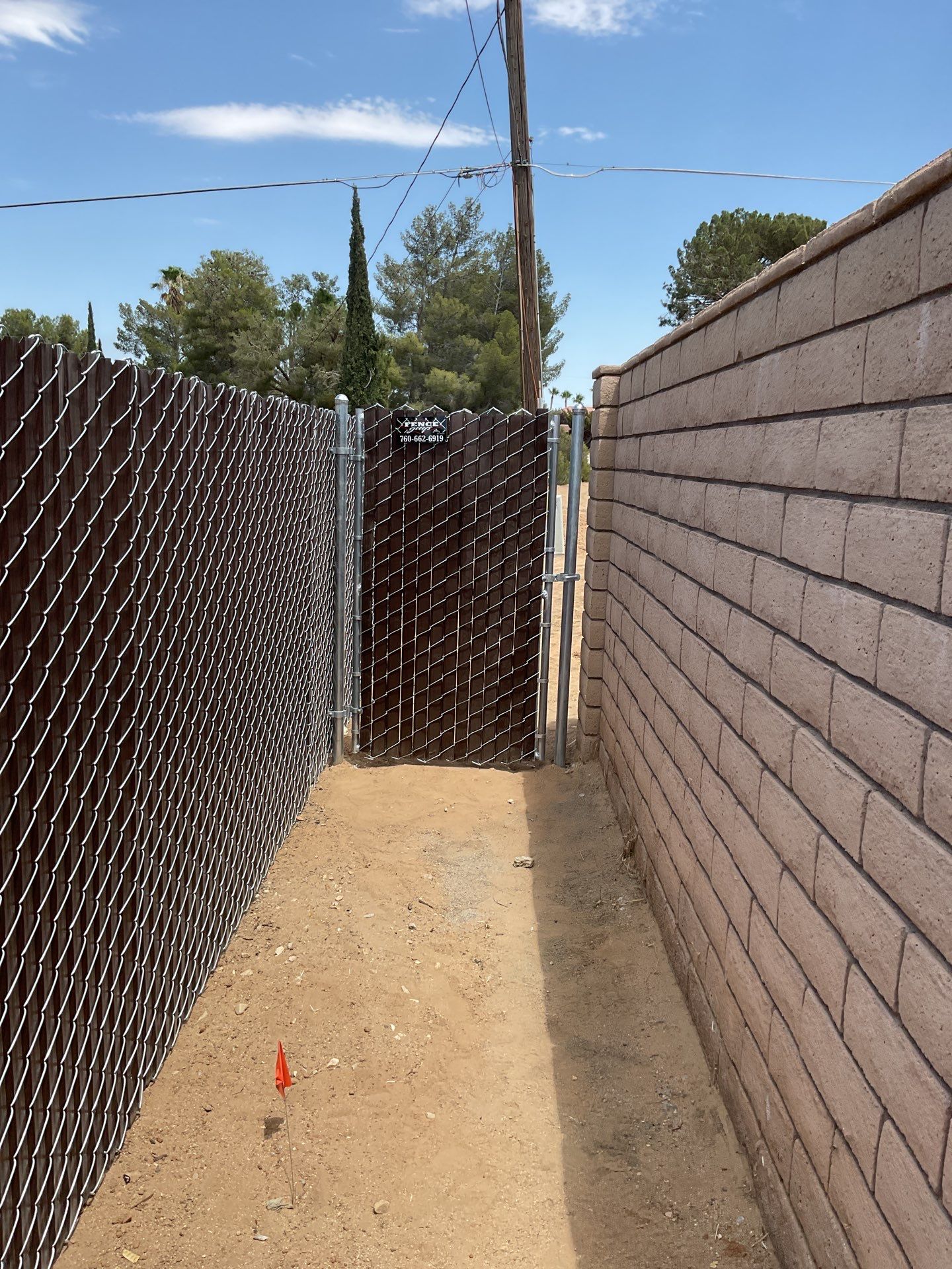 Dark Brown Privacy Chain Link Fence by Fence Guys Inc.