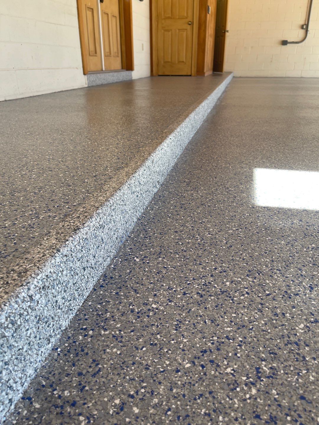 Garages Project in Micanopy, FL in Custom Color by Cross Creek Concrete Coatings