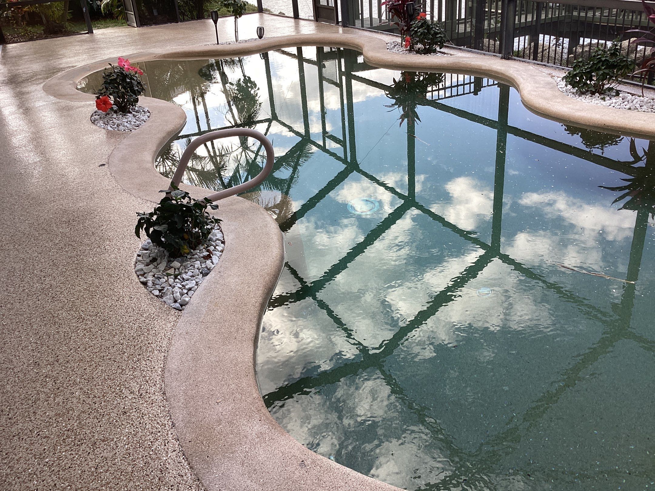 Pool Deck using Pecan by Amvet concrete coatings llc
