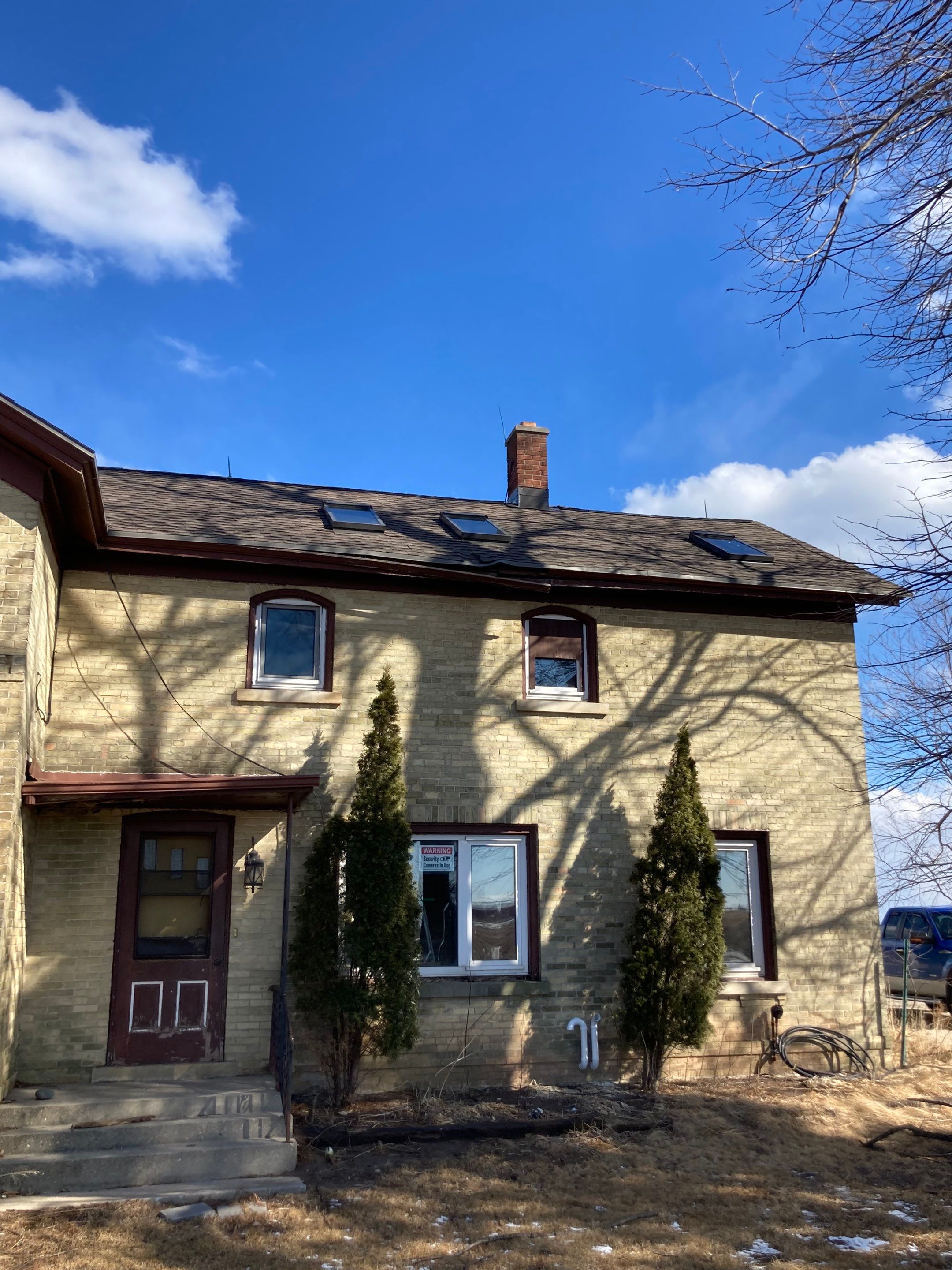  Metal Roof Installation on Residential Brick Home in Oostburg, WI by Gellings Roofing and Siding LLC