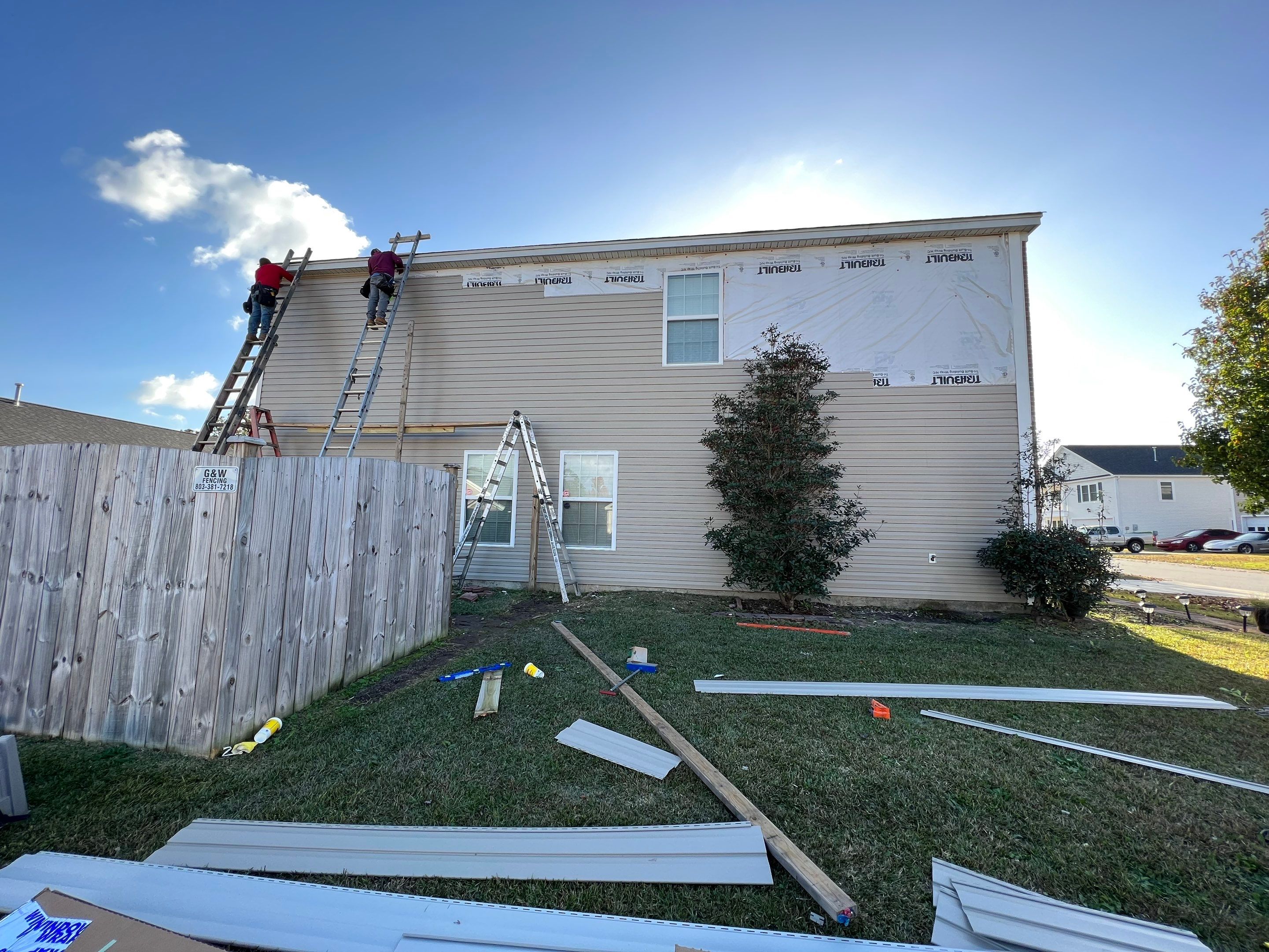 Replaced Wind Damaged Vinyl Siding by Midlands Roofing & Exteriors
