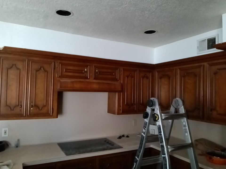 Interior and exterior painting project by Roof Concepts Construction