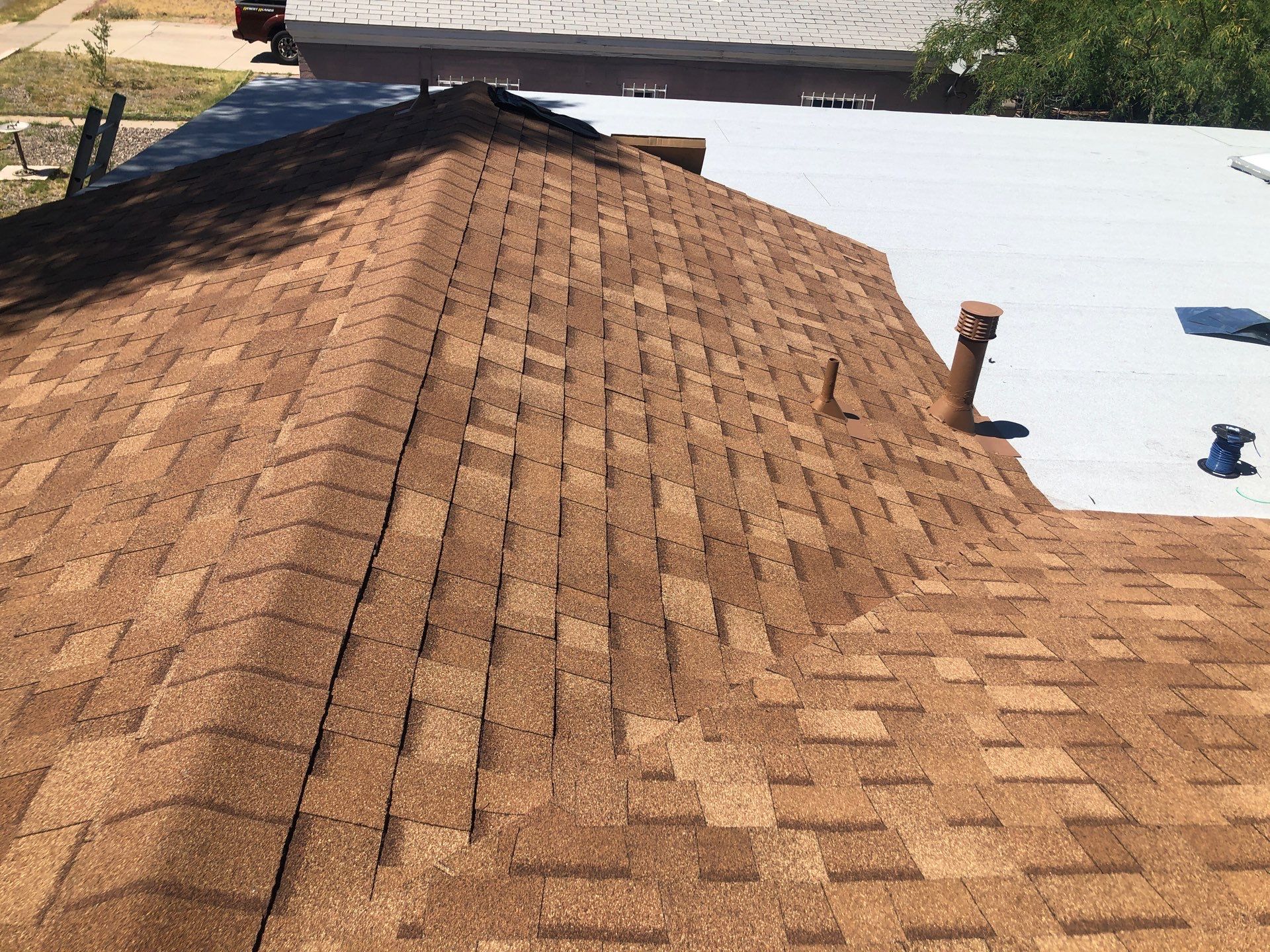 Desert Tan Shingles by Reimagine Roofing