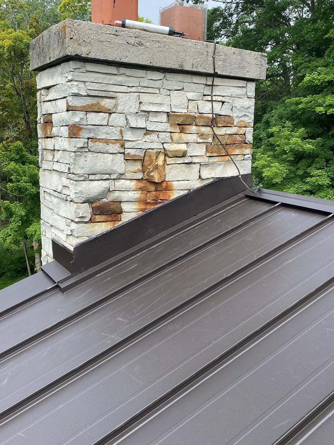 Roof Replacement using 16" Standing Seam Panels by Jay Carter Roofing & Sheet Metal