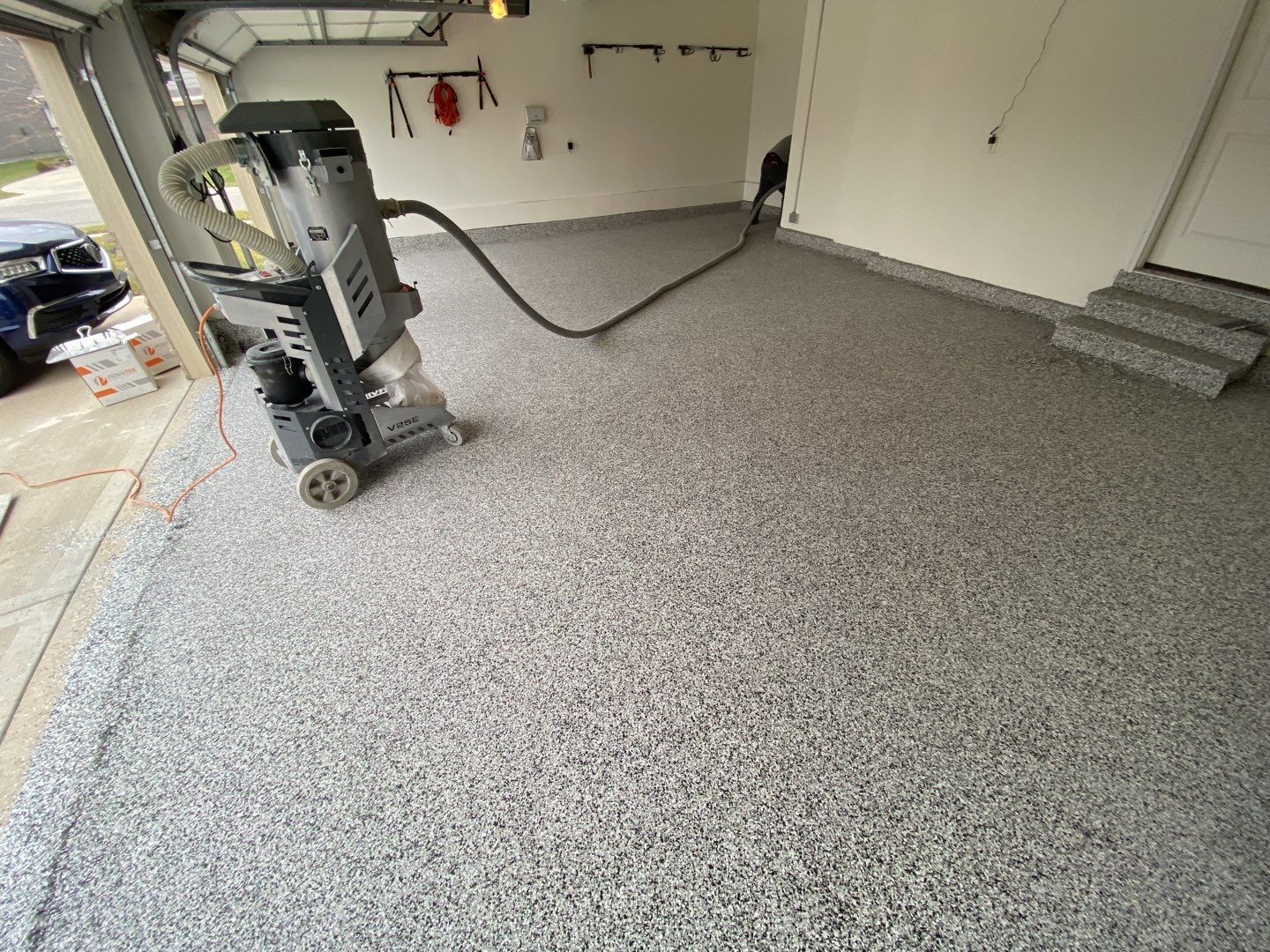 Garage using Domino  by Select Painting, Coatings & Garage Cabinets