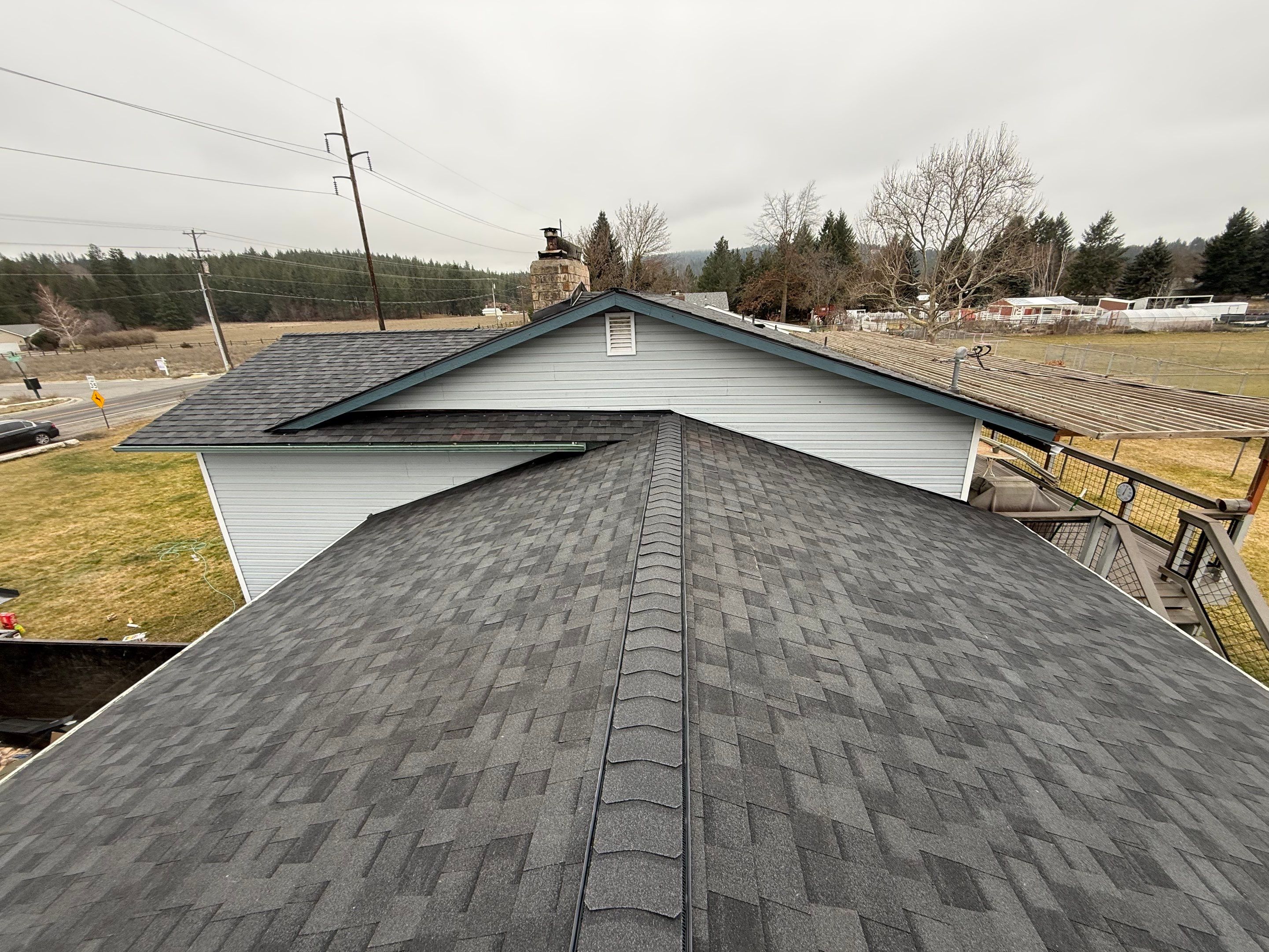 Complete Asphalt Shingle Roof Replacement and Decking Repair in Veradale by Alpine Roofing
