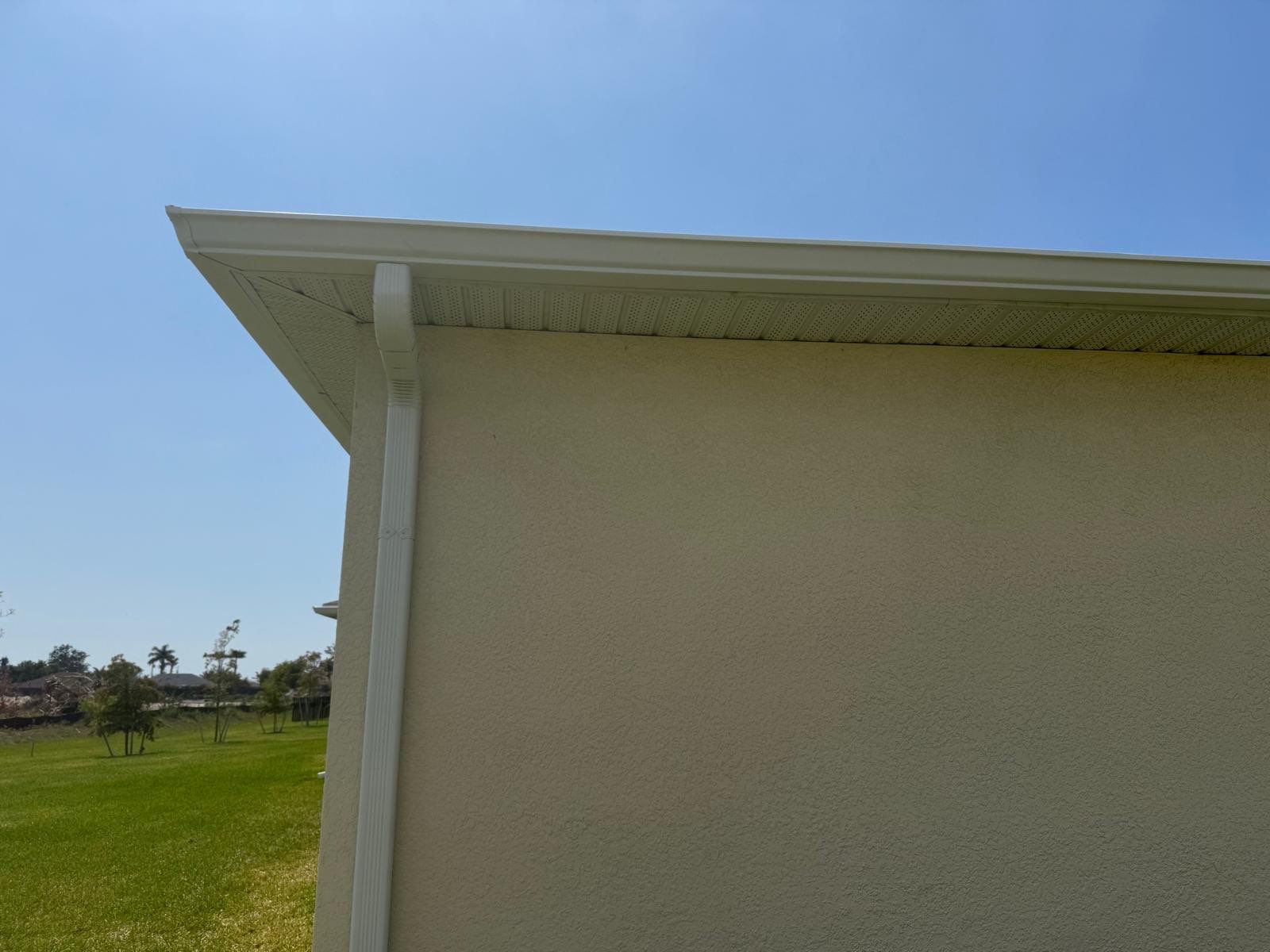 Aluminum Seamless Gutters using 3X4 Elbow Downspout in Cape Coral FL by Gutter Professors