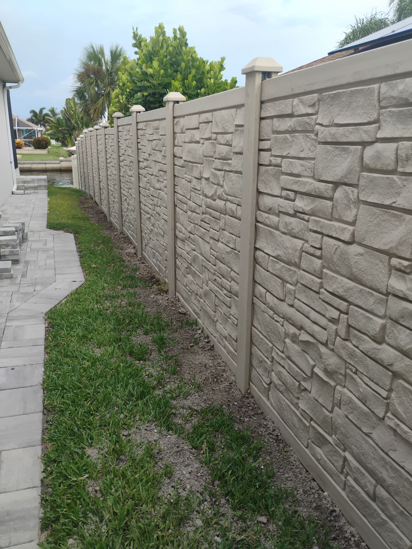 Waterfront Composite Privacy Fence Installation in Port Charlotte by True Fence LLC