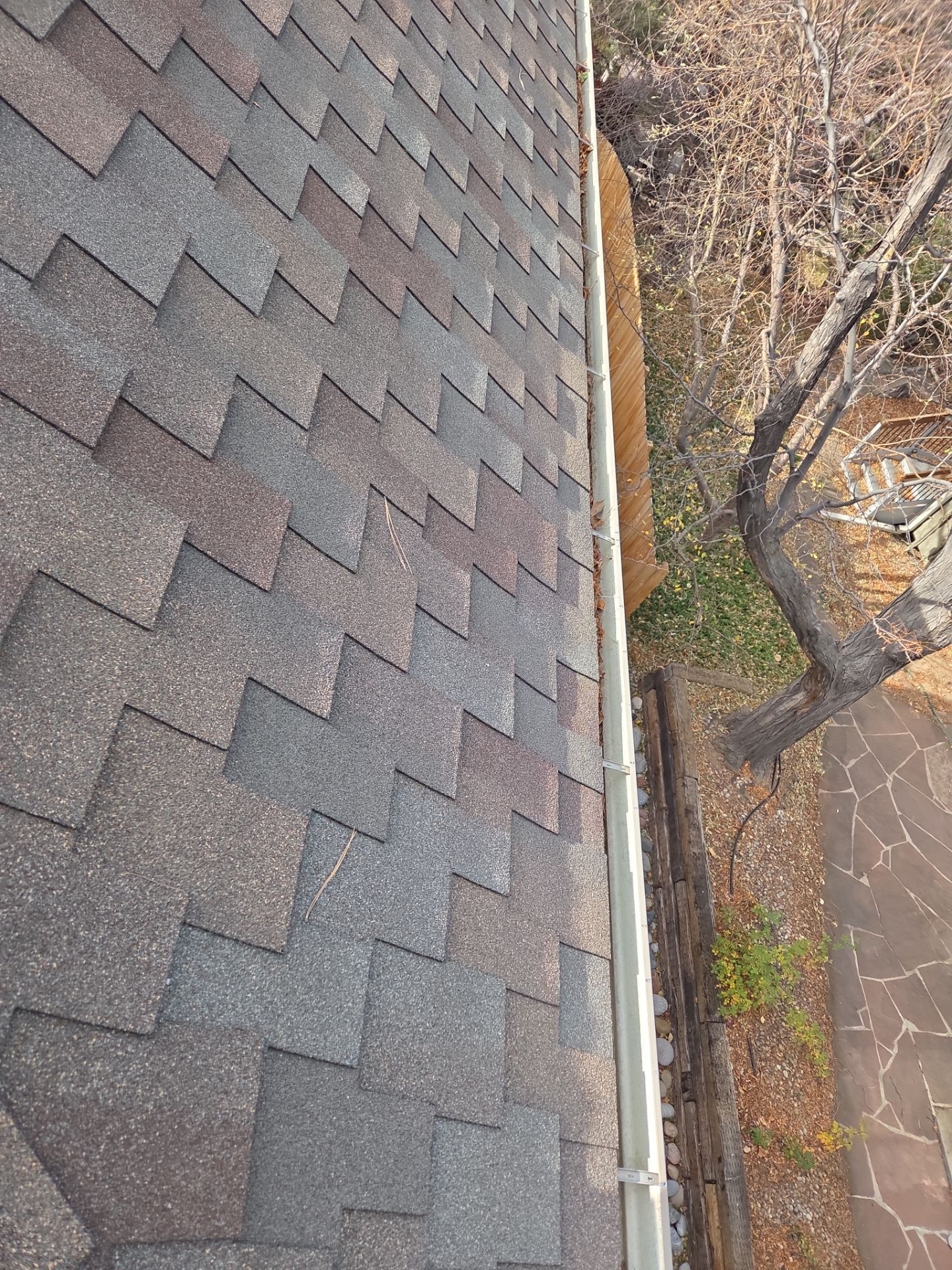 Clean Gutters and Downspouts by RTP Roofing Company