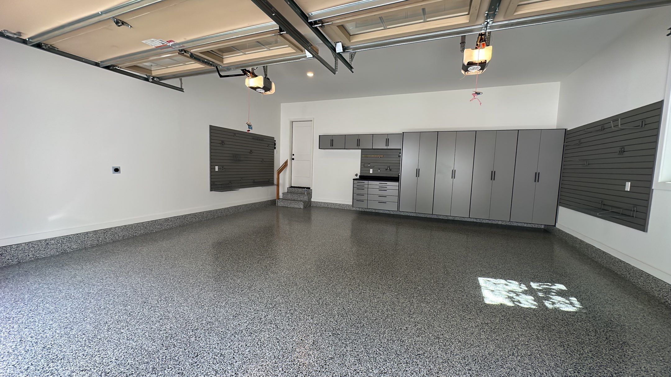 Jeanne E. transformed her garage with cabinets and a Banner Garage Floor by Banner Garage