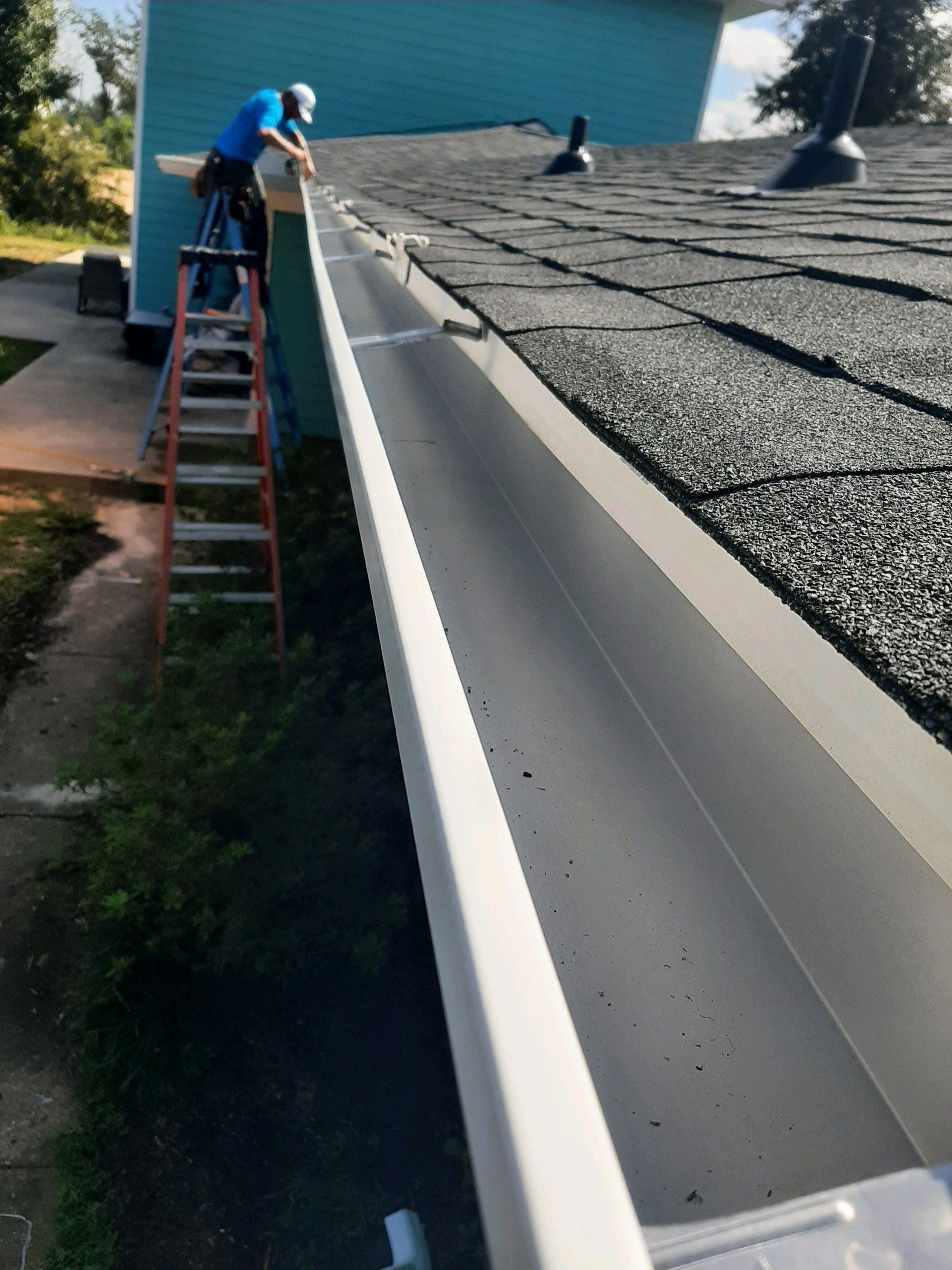 Seamless Gutter Installation using White K-Style Gutters by Gutter Professors