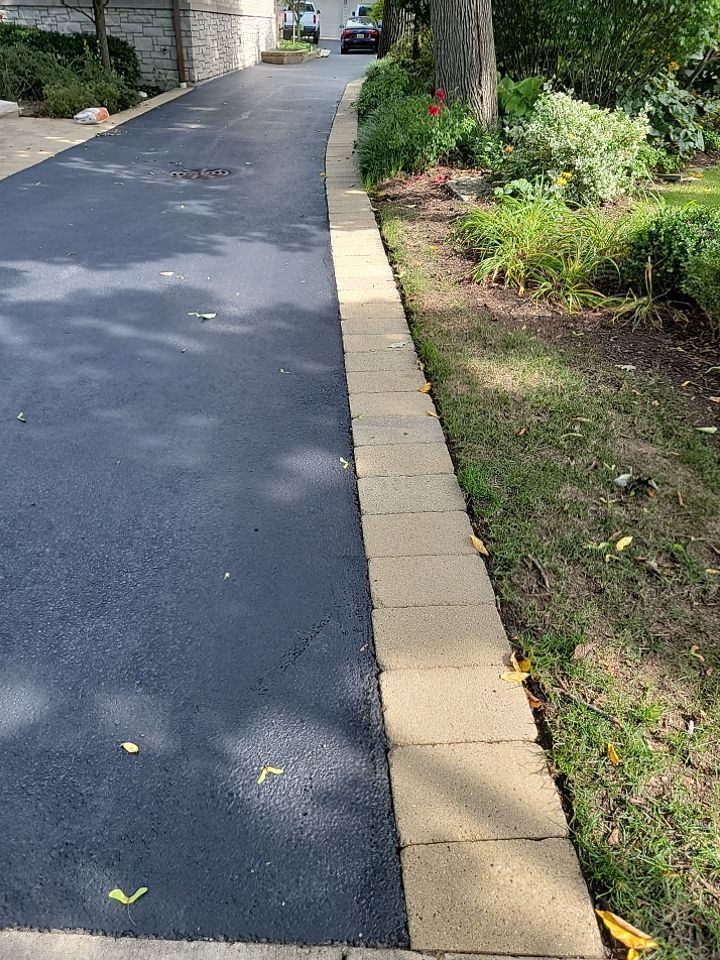 Brick paver clean, sand and seal.  using surebond SB-8700 by Northern Power Washing LLC.