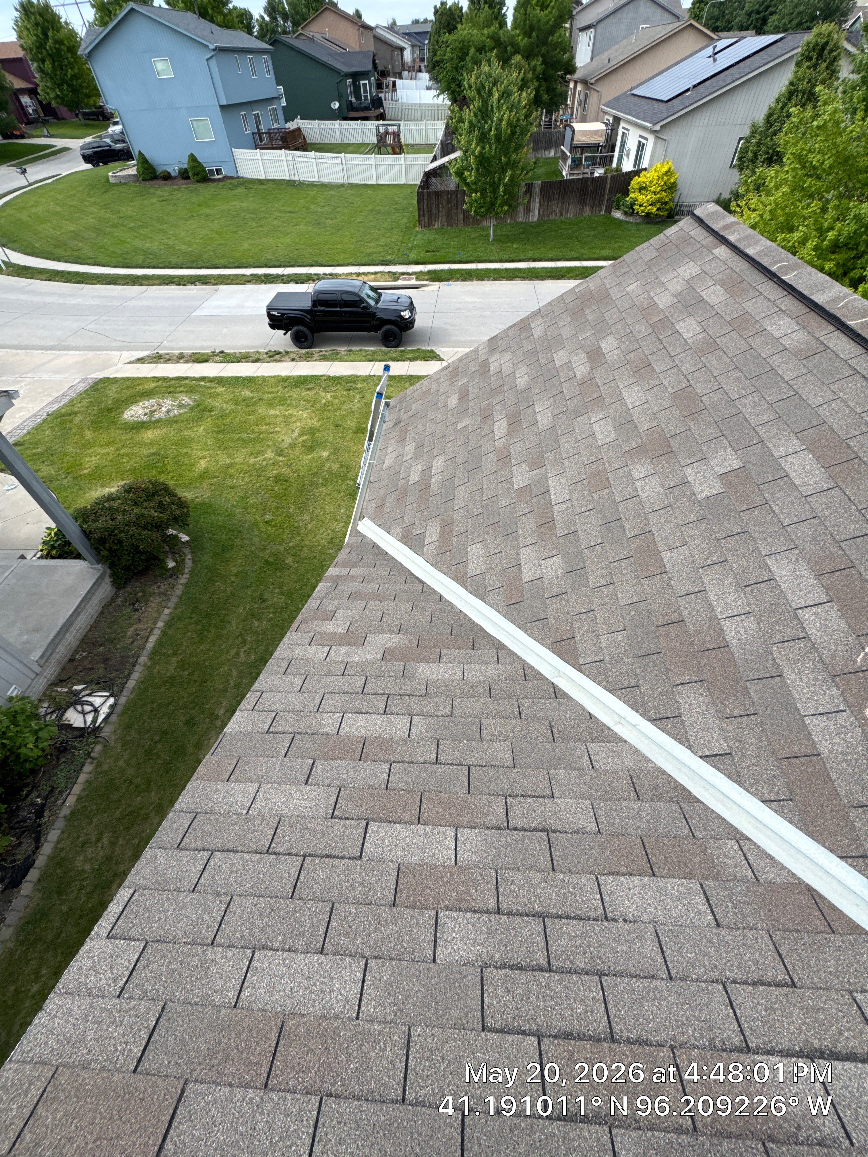 Storm Damage Restoration for Residential Asphalt Shingle Roof in Omaha by Crows Roofing LLC