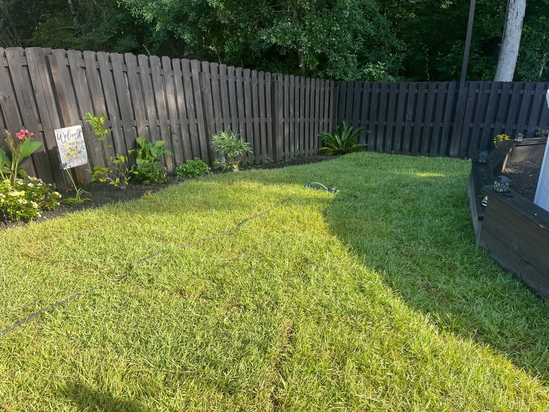 Backyard Sod and Flowerbed Installation in Summerville by Hudson Bros Lawn Care LLC