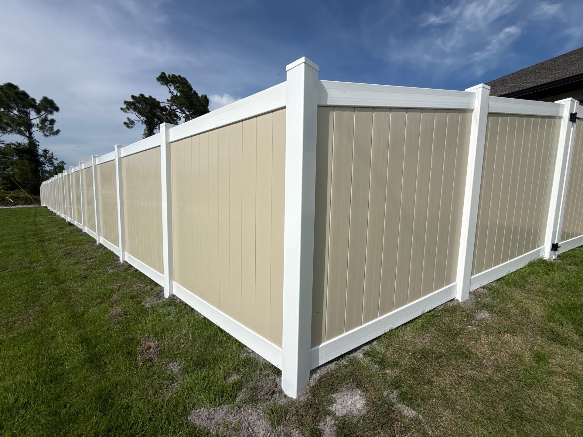 Custom Two-Tone Vinyl Privacy Fence Installation in North Port by True Fence LLC