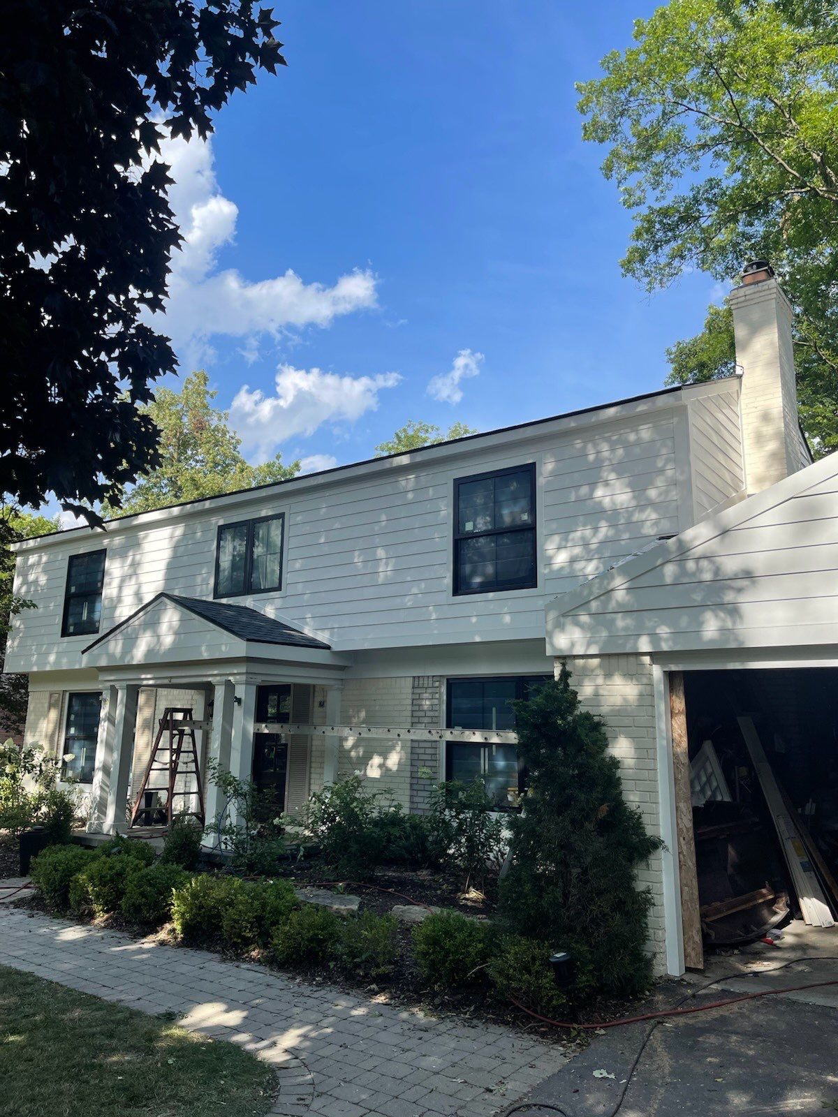Siding Replacement using Hardie Plank S8 1/4"  Arctic White by 180 Contractors