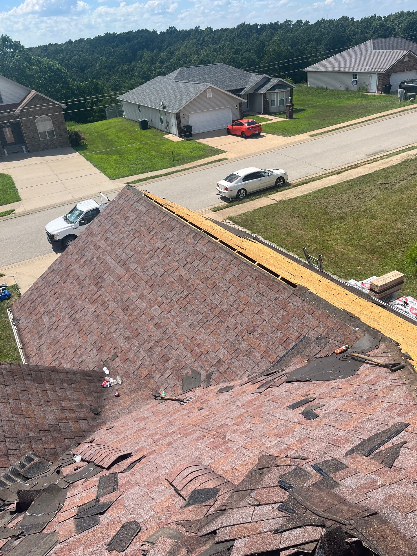 Residential Roofing & Gutters + Downspouts Install  by Titan Commercial & Residential Roofing 